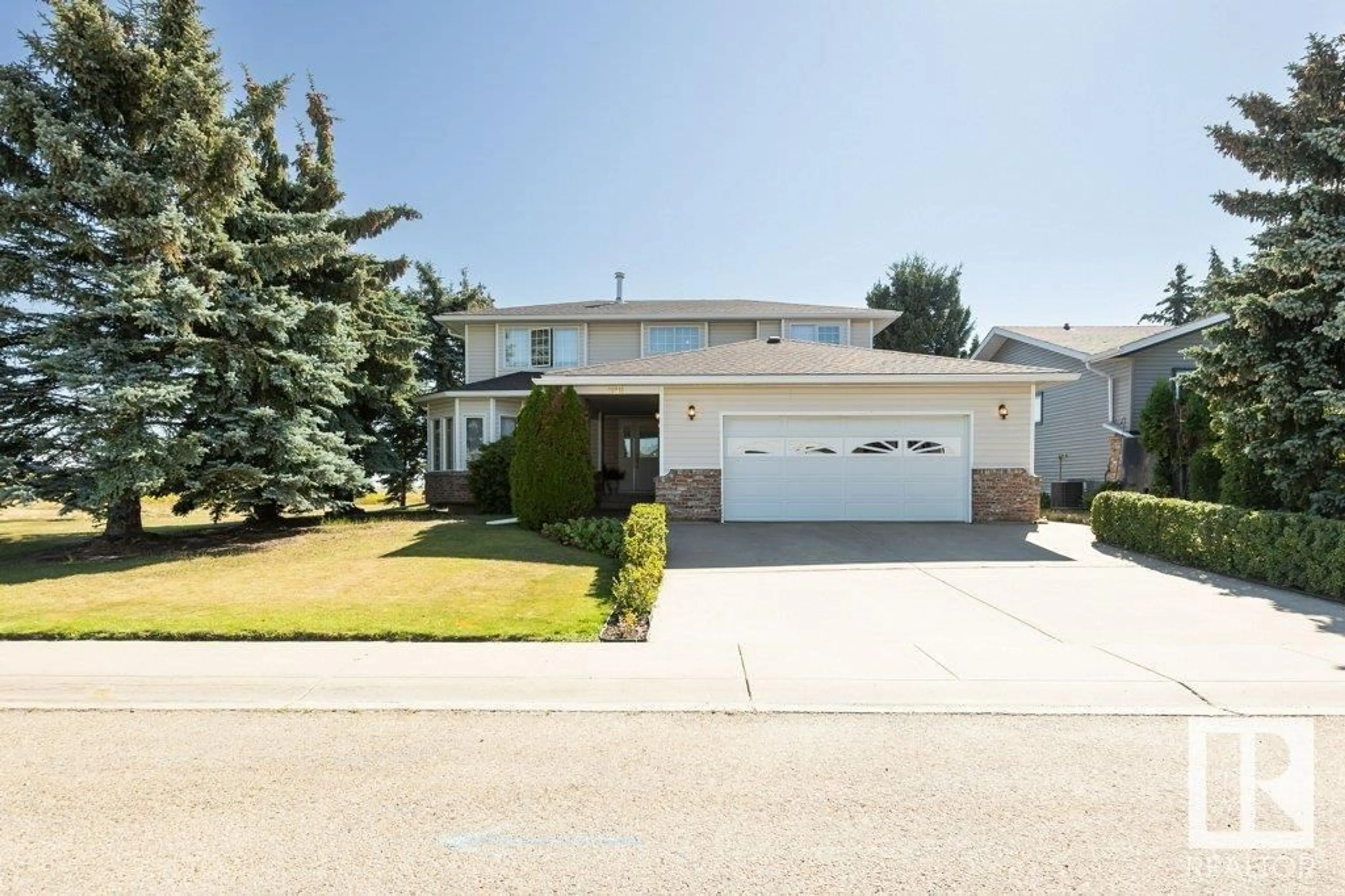 Home with vinyl exterior material, street for 11011 108 AV, Westlock Alberta T7P1A4
