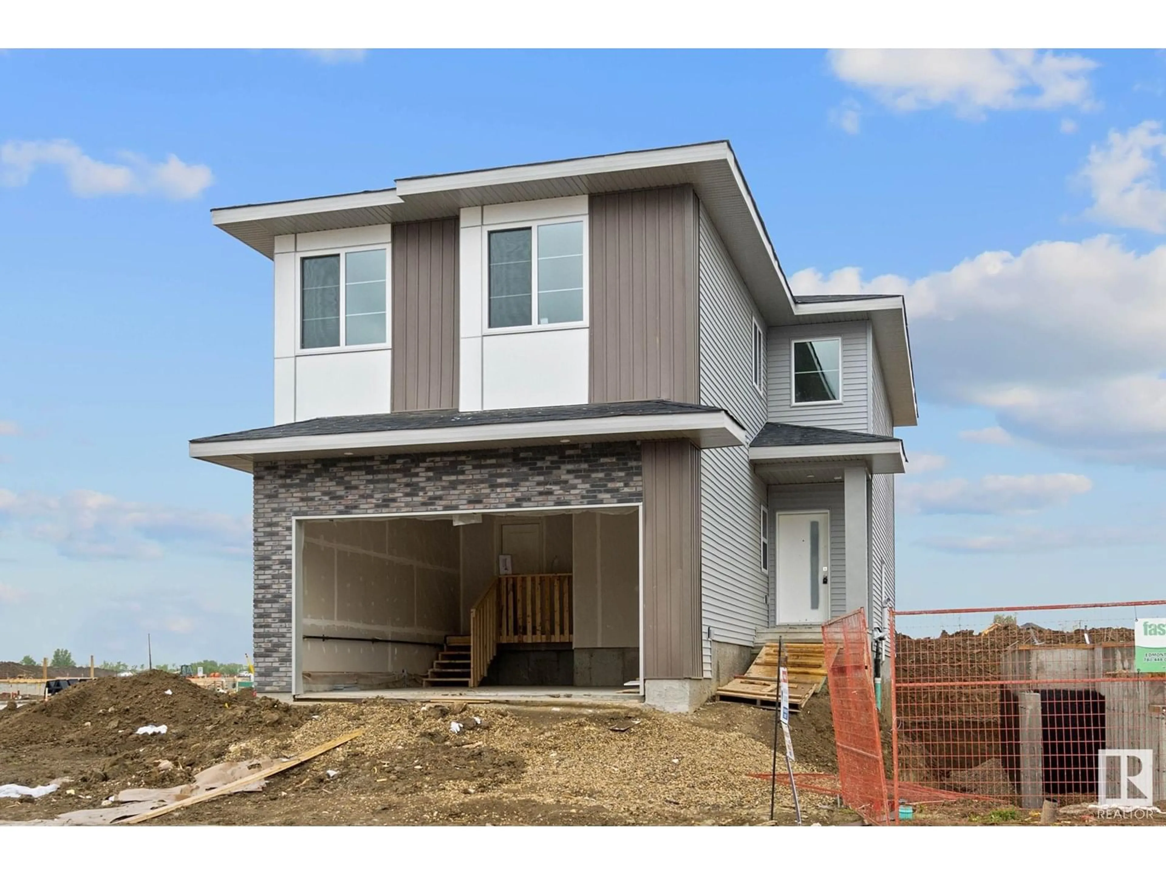 Home with vinyl exterior material, street for 2508 210 ST, Edmonton Alberta T6M2M7