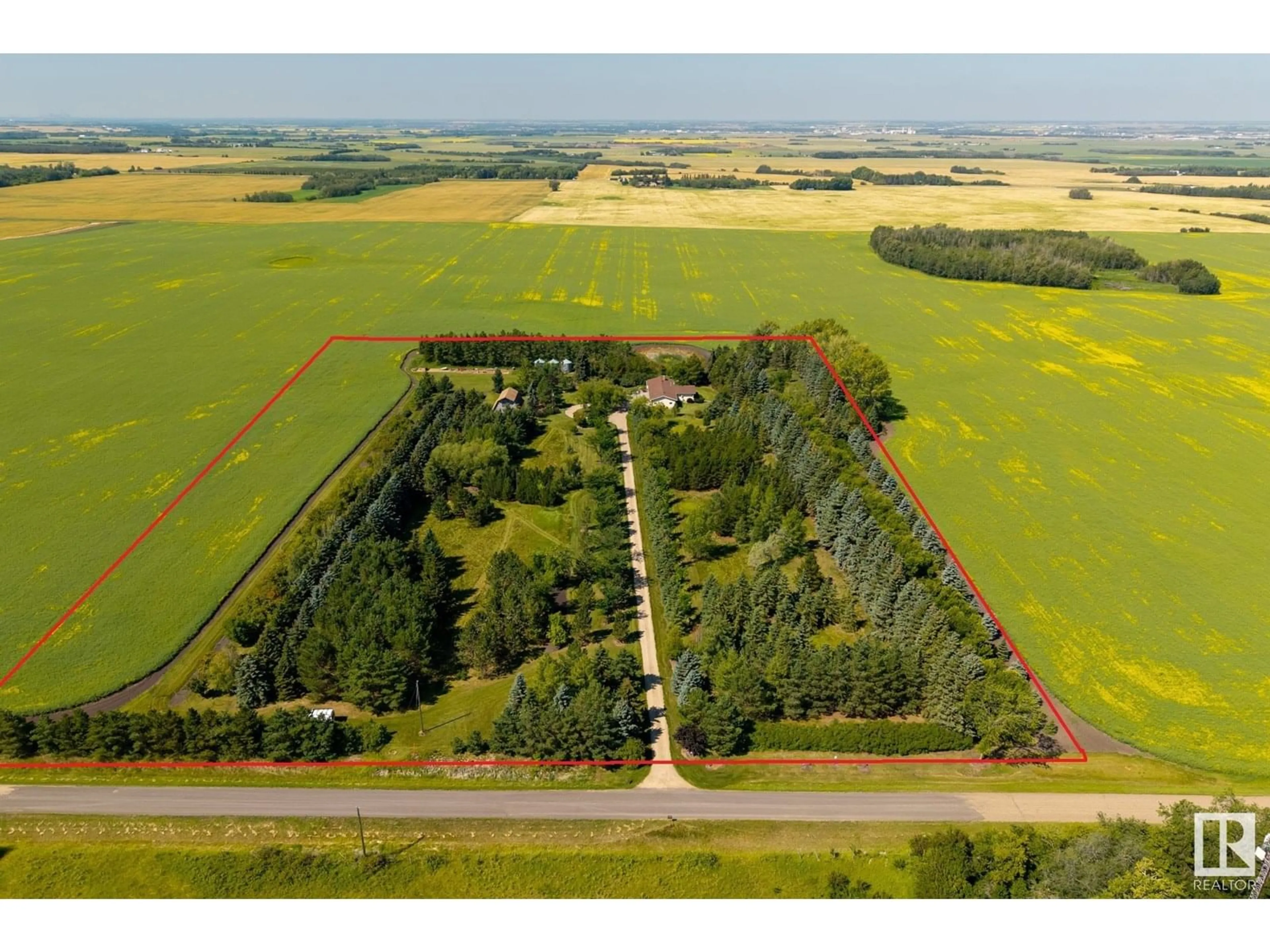 A pic from outside/outdoor area/front of a property/back of a property/a pic from drone, forest/trees view for 54508 RGE ROAD 214, Rural Strathcona County Alberta T8L4B9