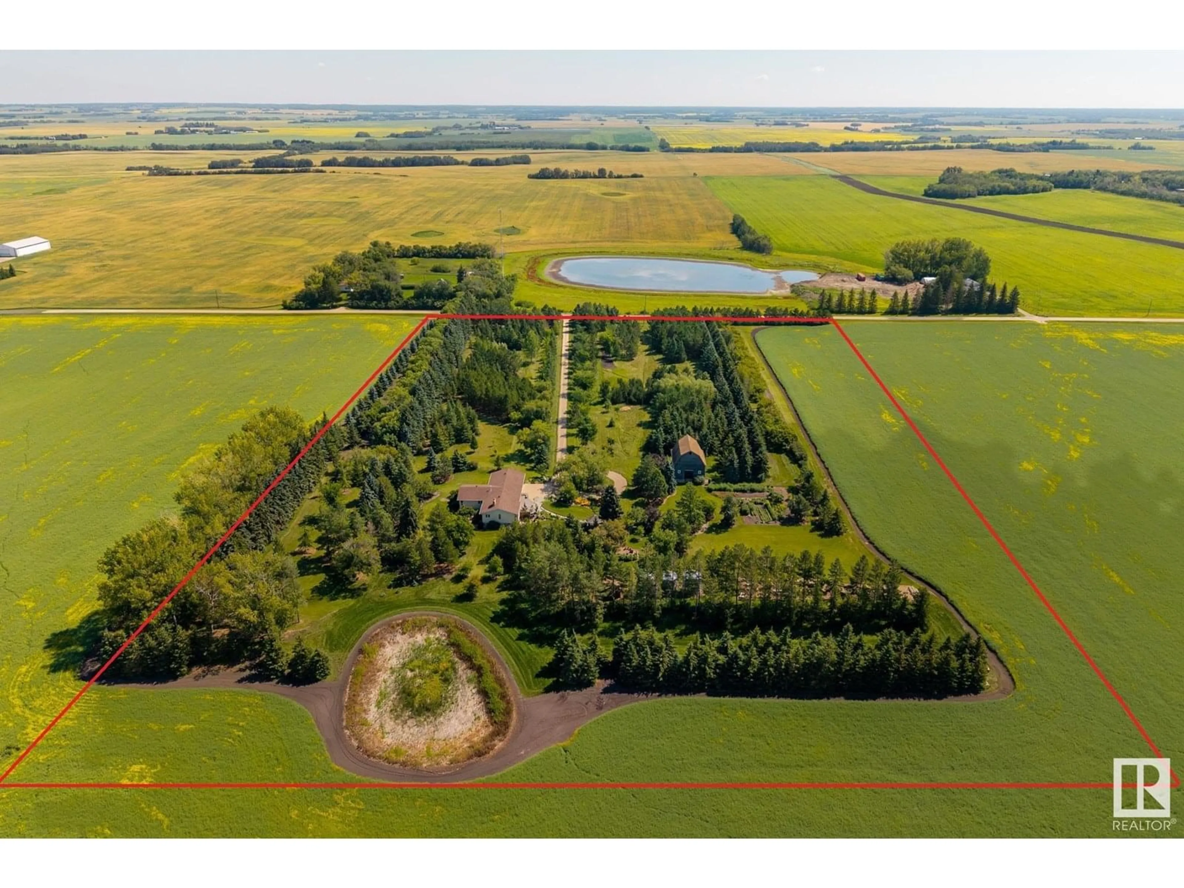 A pic from outside/outdoor area/front of a property/back of a property/a pic from drone, forest/trees view for 54508 RGE ROAD 214, Rural Strathcona County Alberta T8L4B9