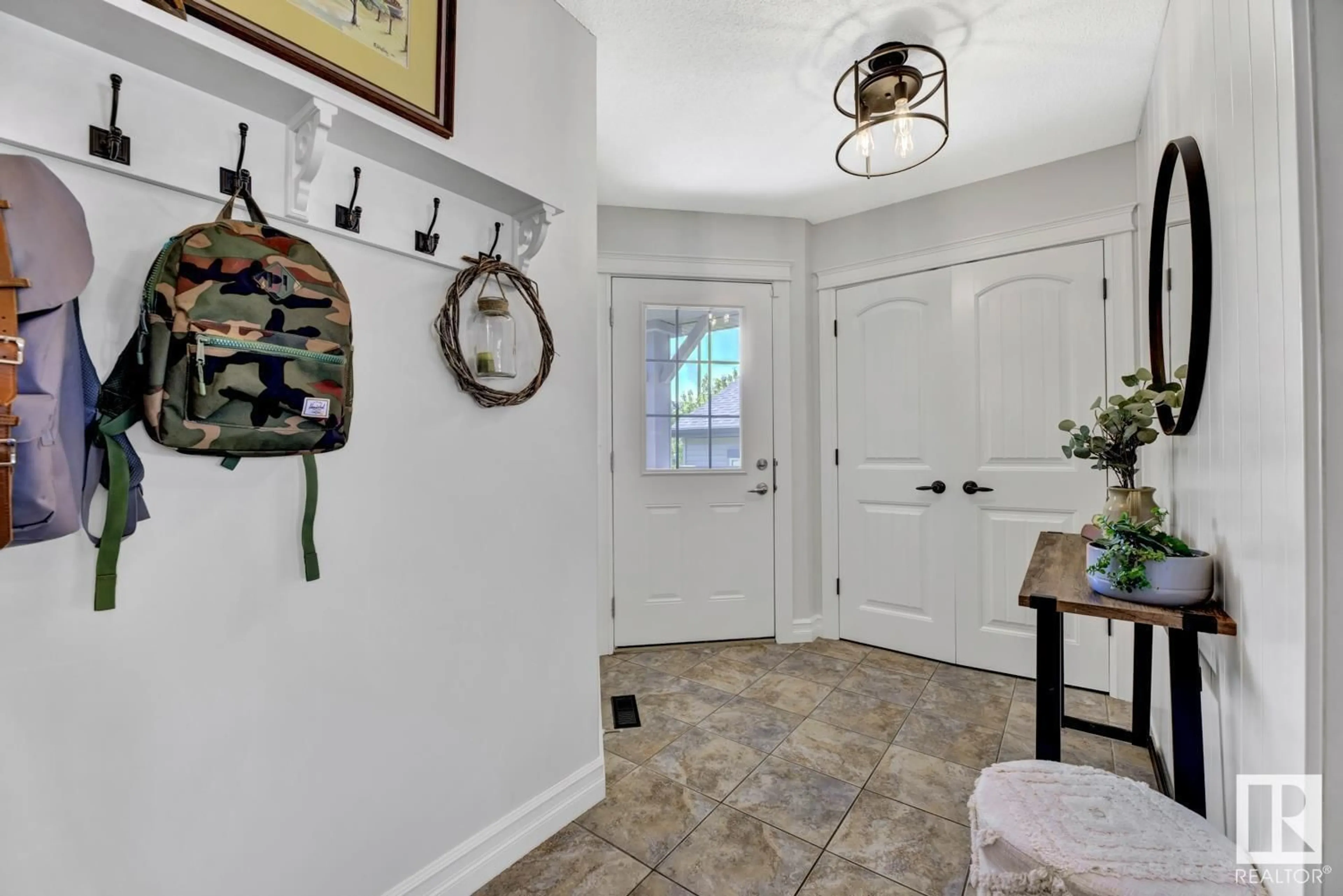 Indoor entryway for 6008 13 AV, Edmonton Alberta T6X0M7