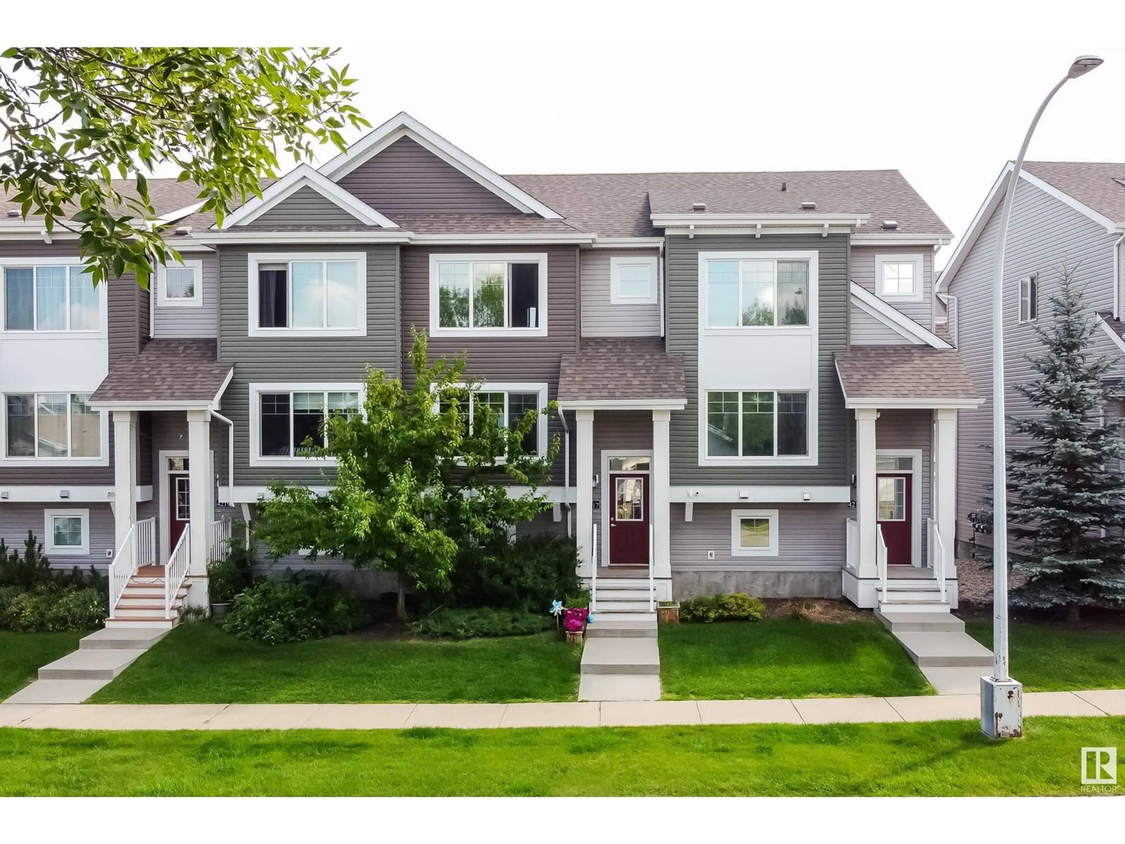 Home with vinyl exterior material, street for 4217 30 ST, Edmonton Alberta T6T2G9