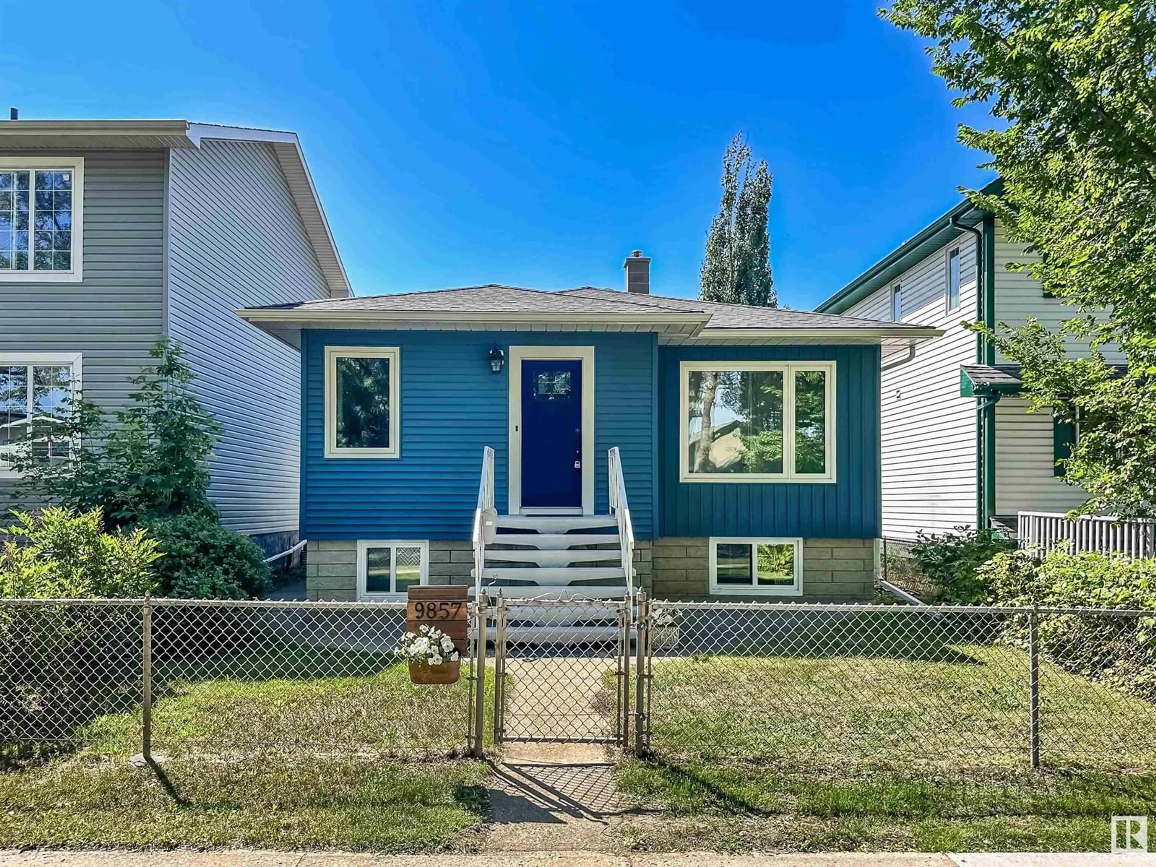 Home with vinyl exterior material, street for 9857 74 AV, Edmonton Alberta T6E1G1
