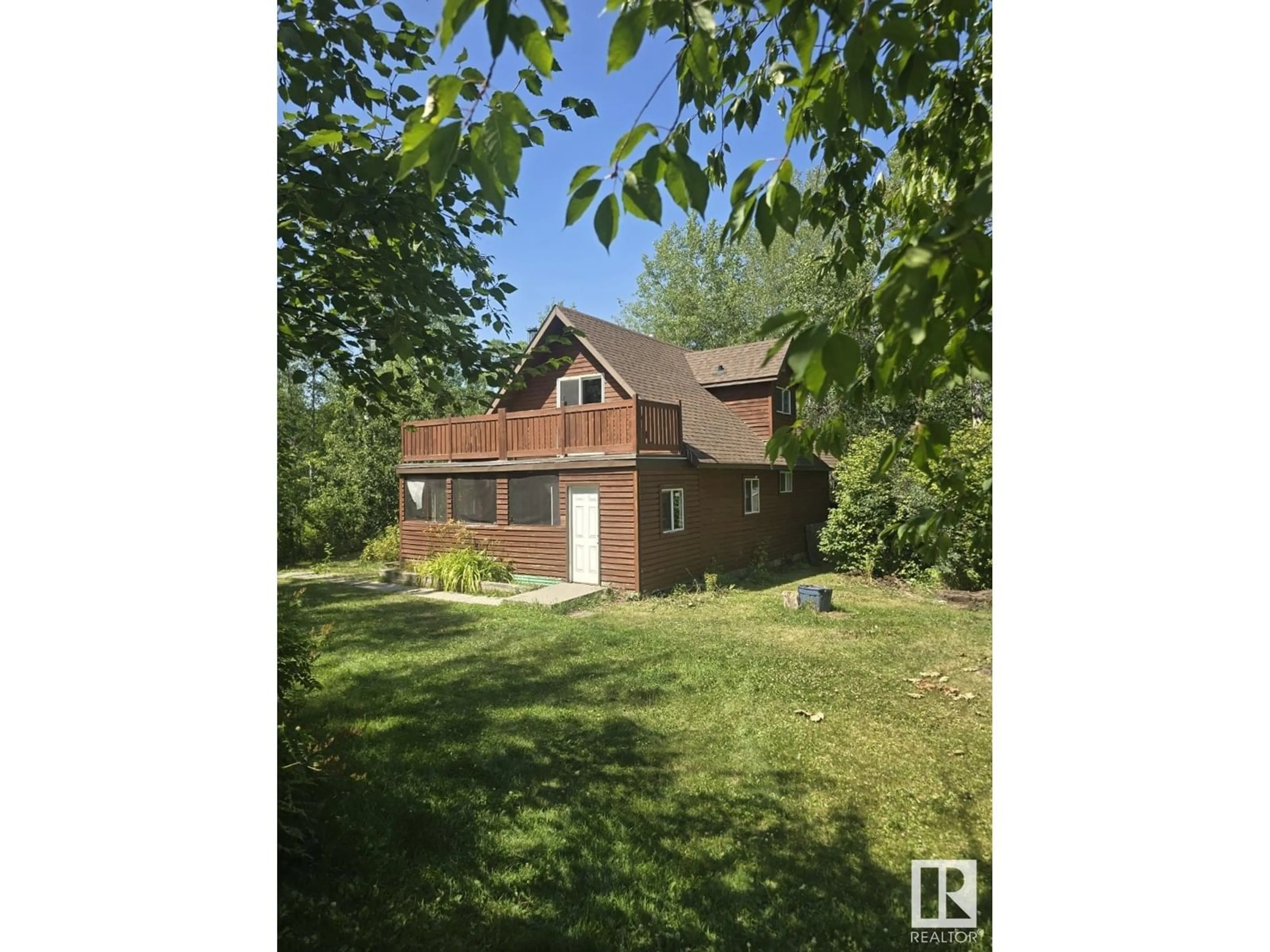 A pic from outside/outdoor area/front of a property/back of a property/a pic from drone, building for 54425 - 205 STE. ANNE TR, Rural Lac Ste. Anne County Alberta T0E0B0
