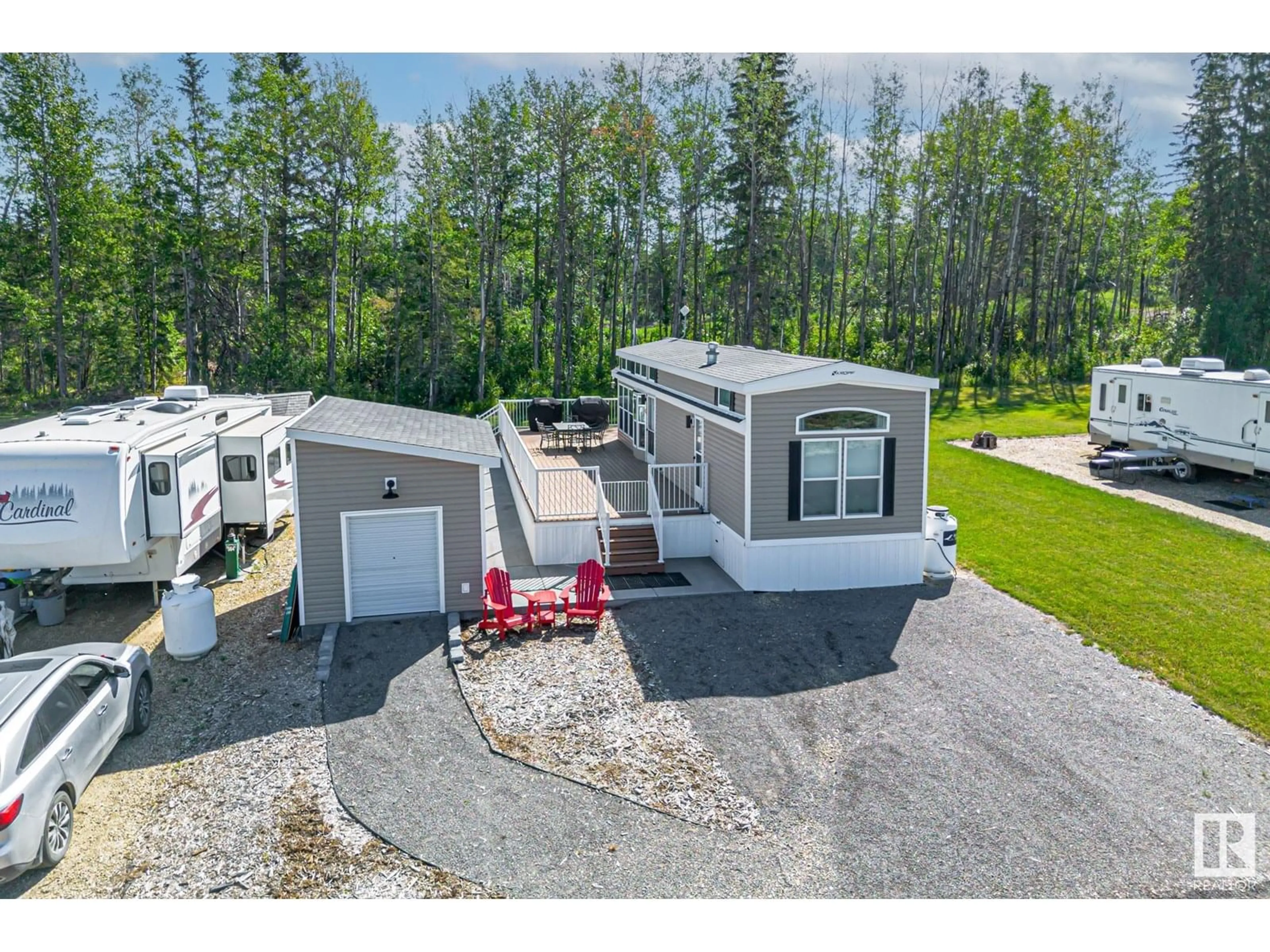 A pic from outside/outdoor area/front of a property/back of a property/a pic from drone, unknown for 565 53126 RGE ROAD 70, Rural Parkland County Alberta T7Z1M1