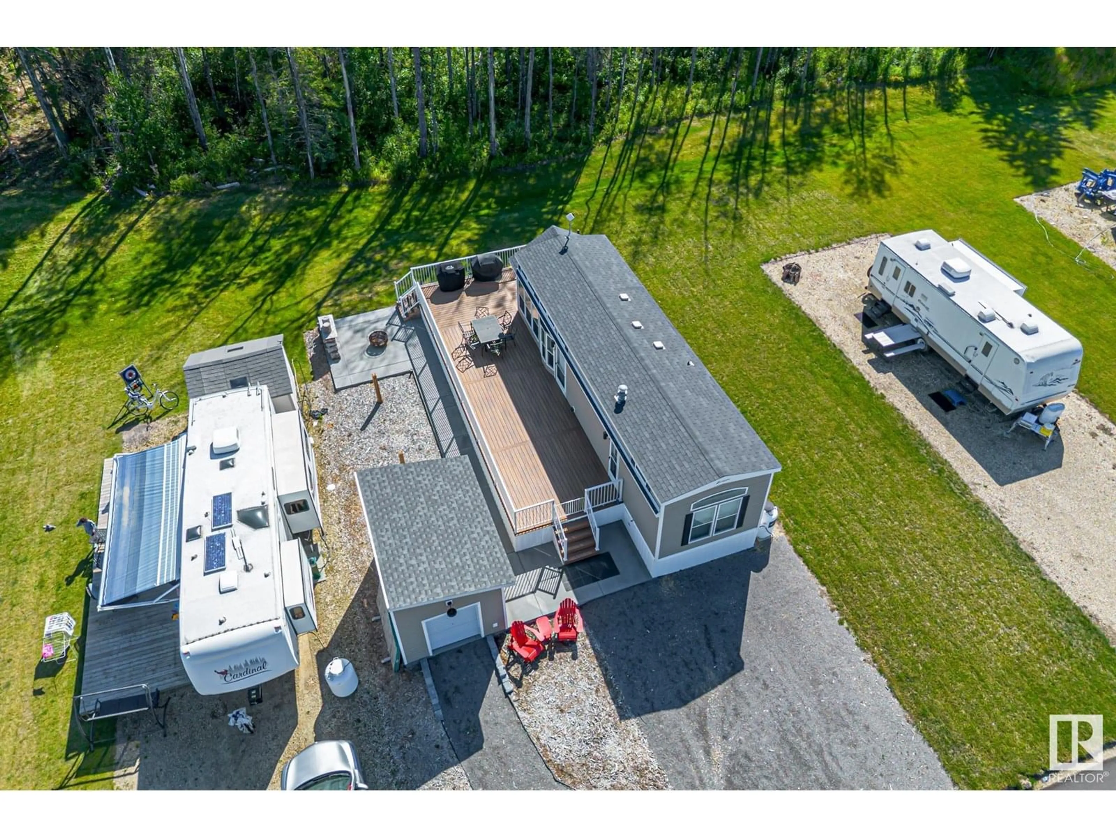 A pic from outside/outdoor area/front of a property/back of a property/a pic from drone, unknown for 565 53126 RGE ROAD 70, Rural Parkland County Alberta T7Z1M1