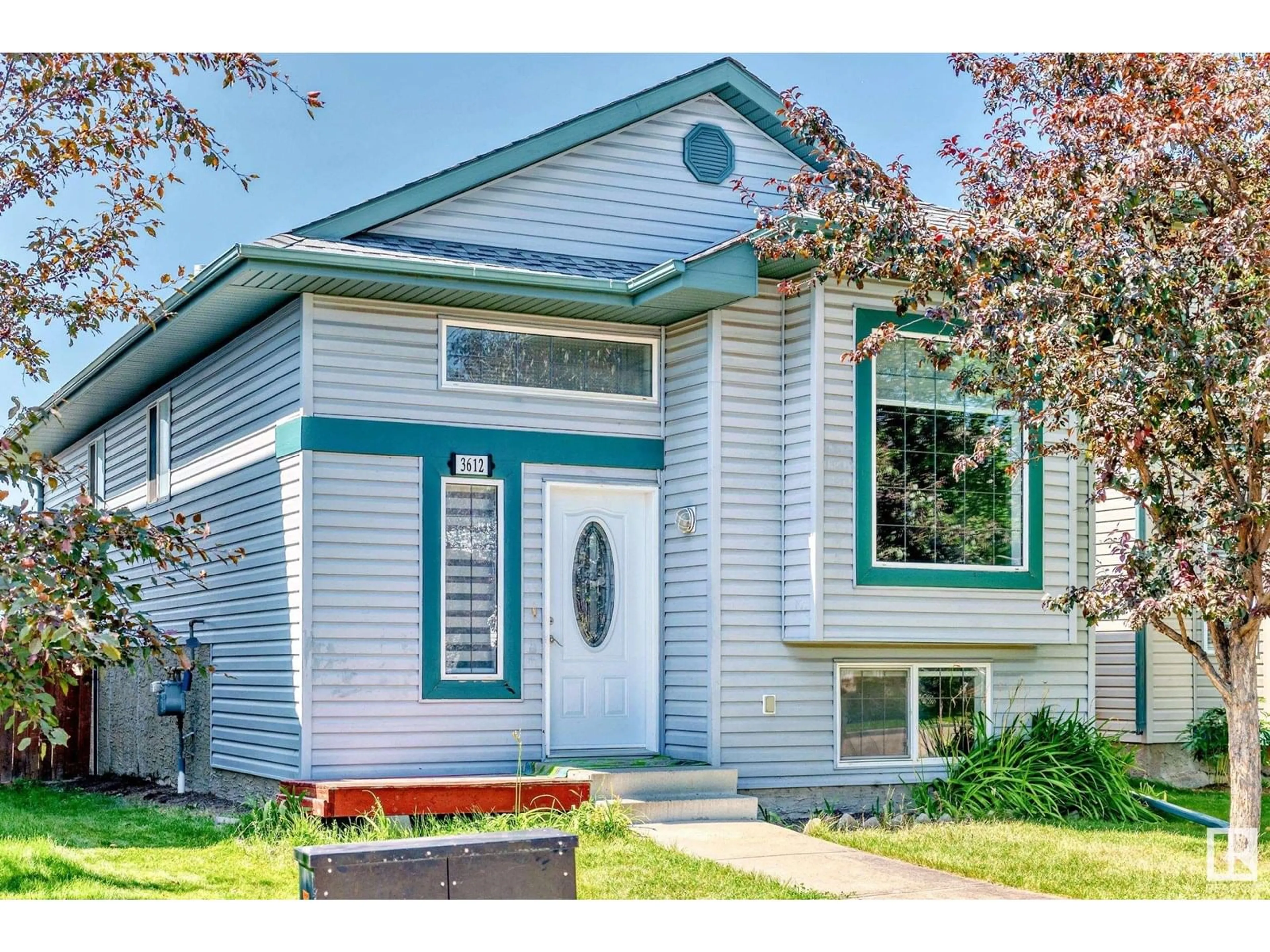 Home with vinyl exterior material, street for NW - 3612 22 ST, Edmonton Alberta T6T1S2