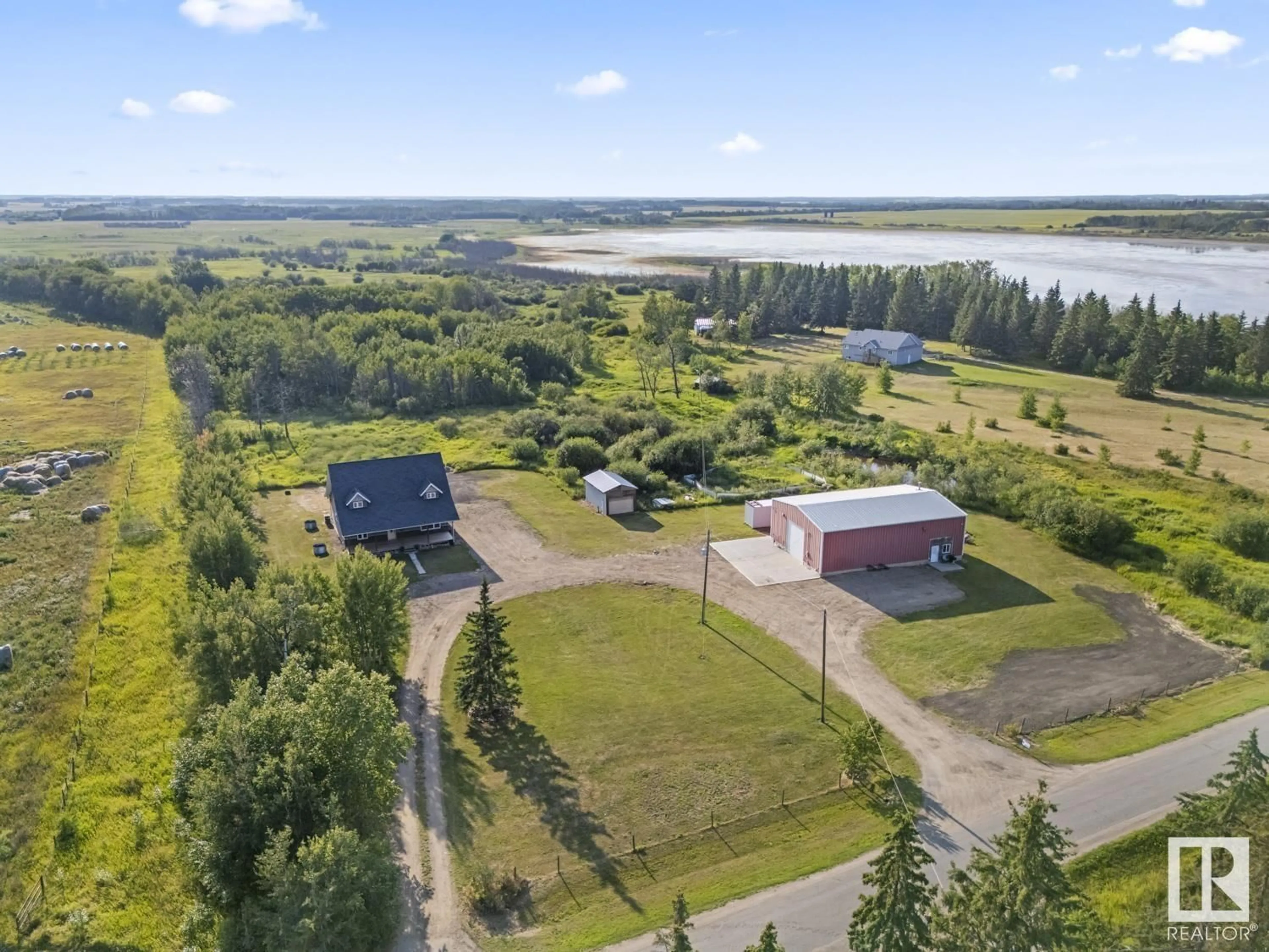 A pic from outside/outdoor area/front of a property/back of a property/a pic from drone, water/lake/river/ocean view for 61218 RG RD 442, Rural Bonnyville M.D. Alberta T0A0B0