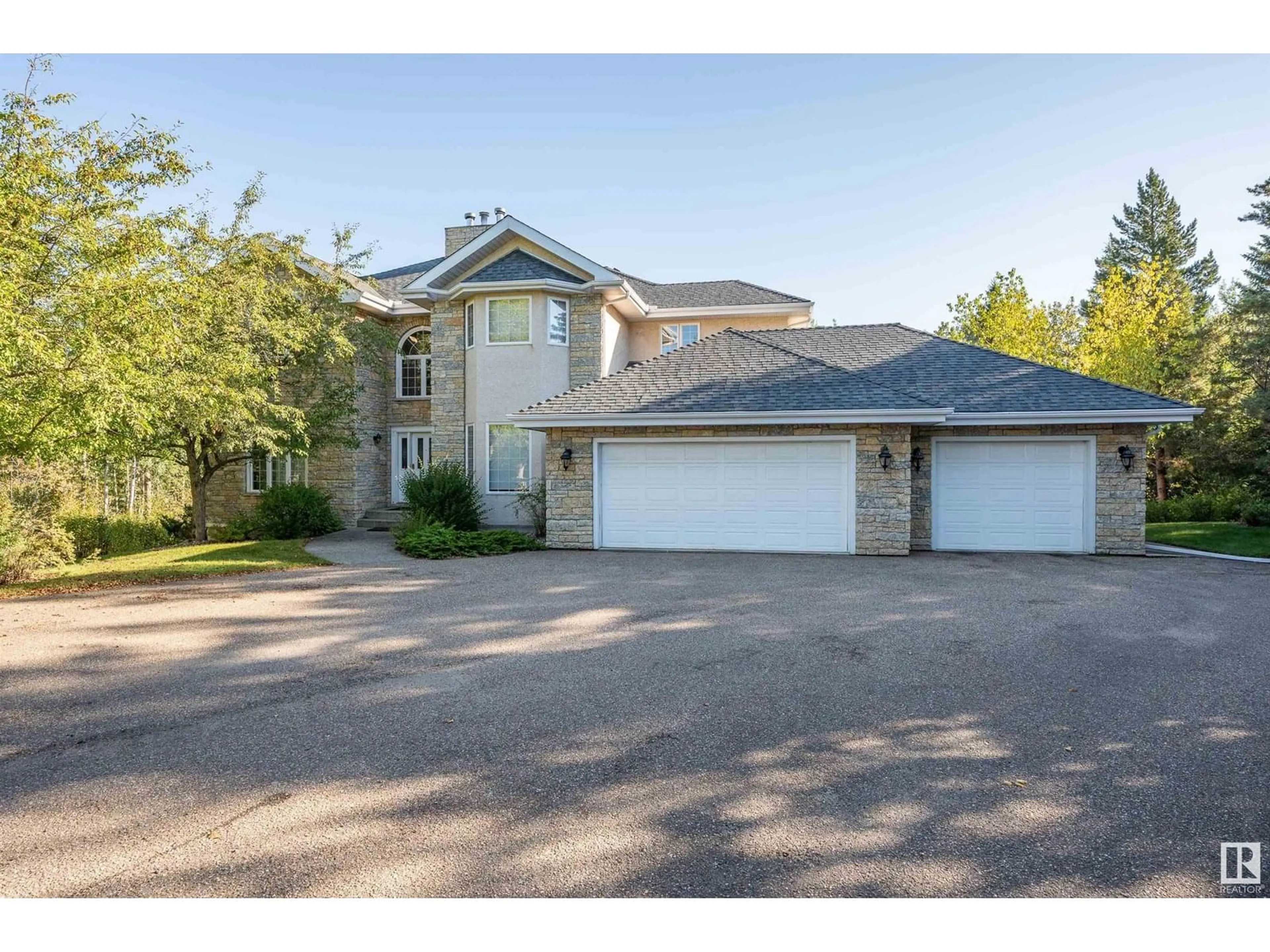 A pic from outside/outdoor area/front of a property/back of a property/a pic from drone, street for 52258 - 25 RGE ROAD 231, Rural Strathcona County Alberta T8B1M8