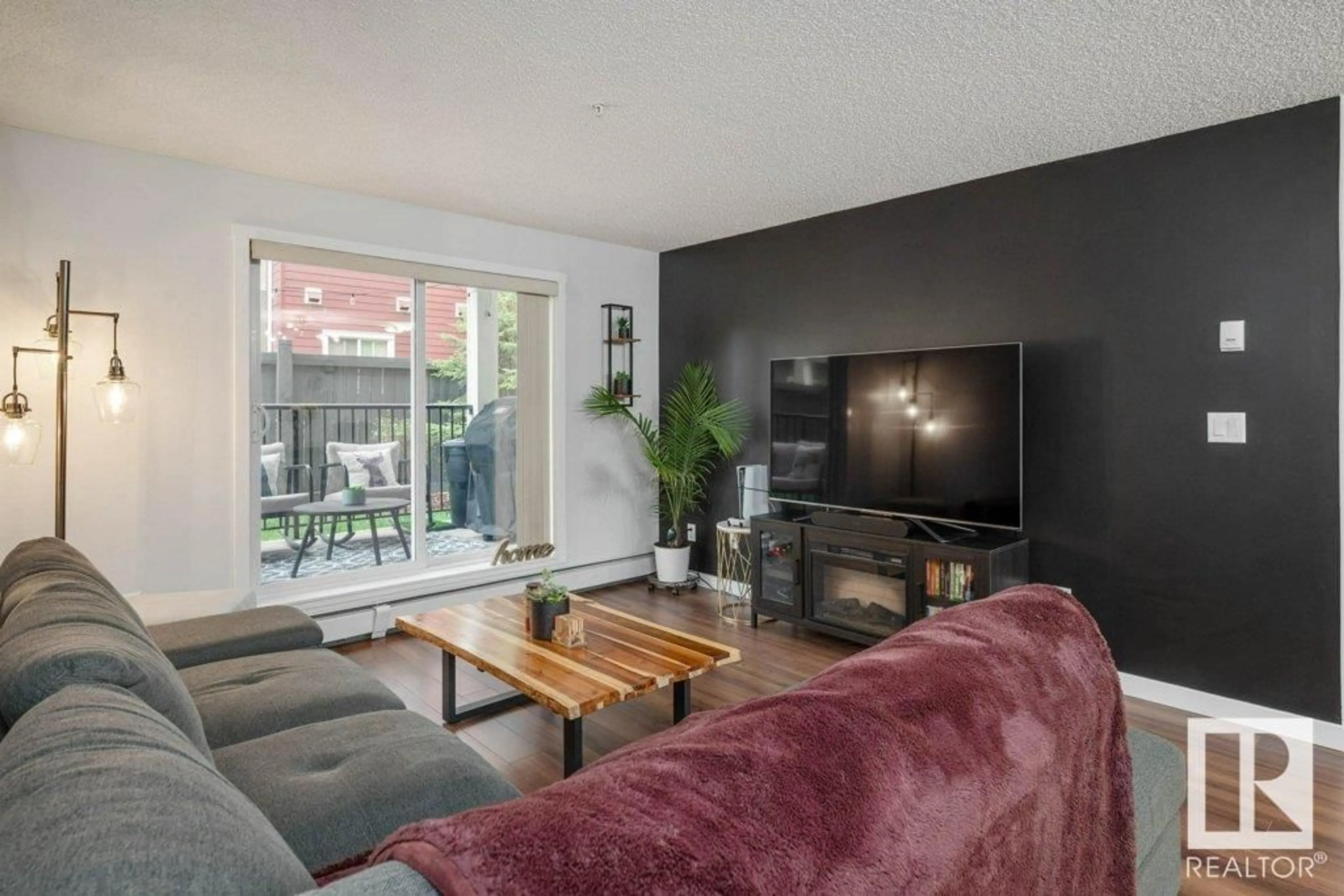 Living room with furniture, unknown for 6076 - 138 SCHONSEE WY, Edmonton Alberta T5Z0K8