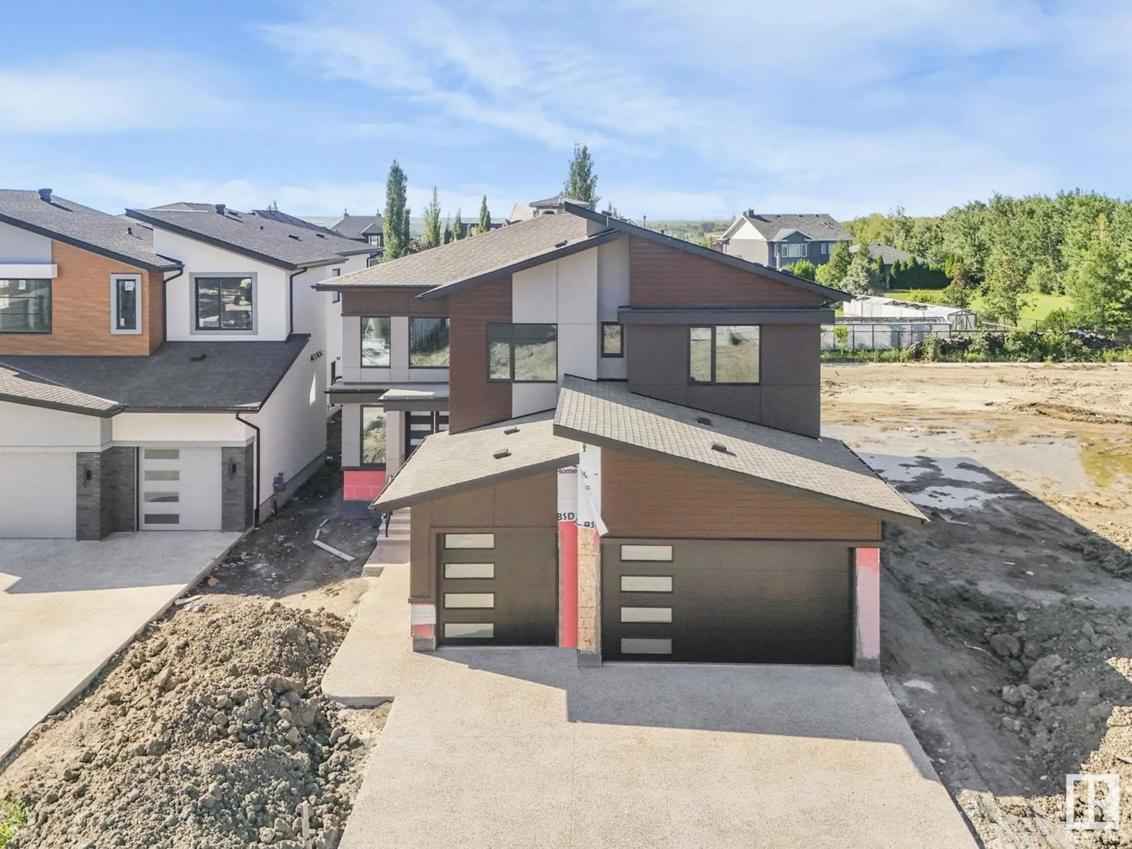 A pic from outside/outdoor area/front of a property/back of a property/a pic from drone, street for NE - 715 165 AV, Edmonton Alberta T5Y4J1