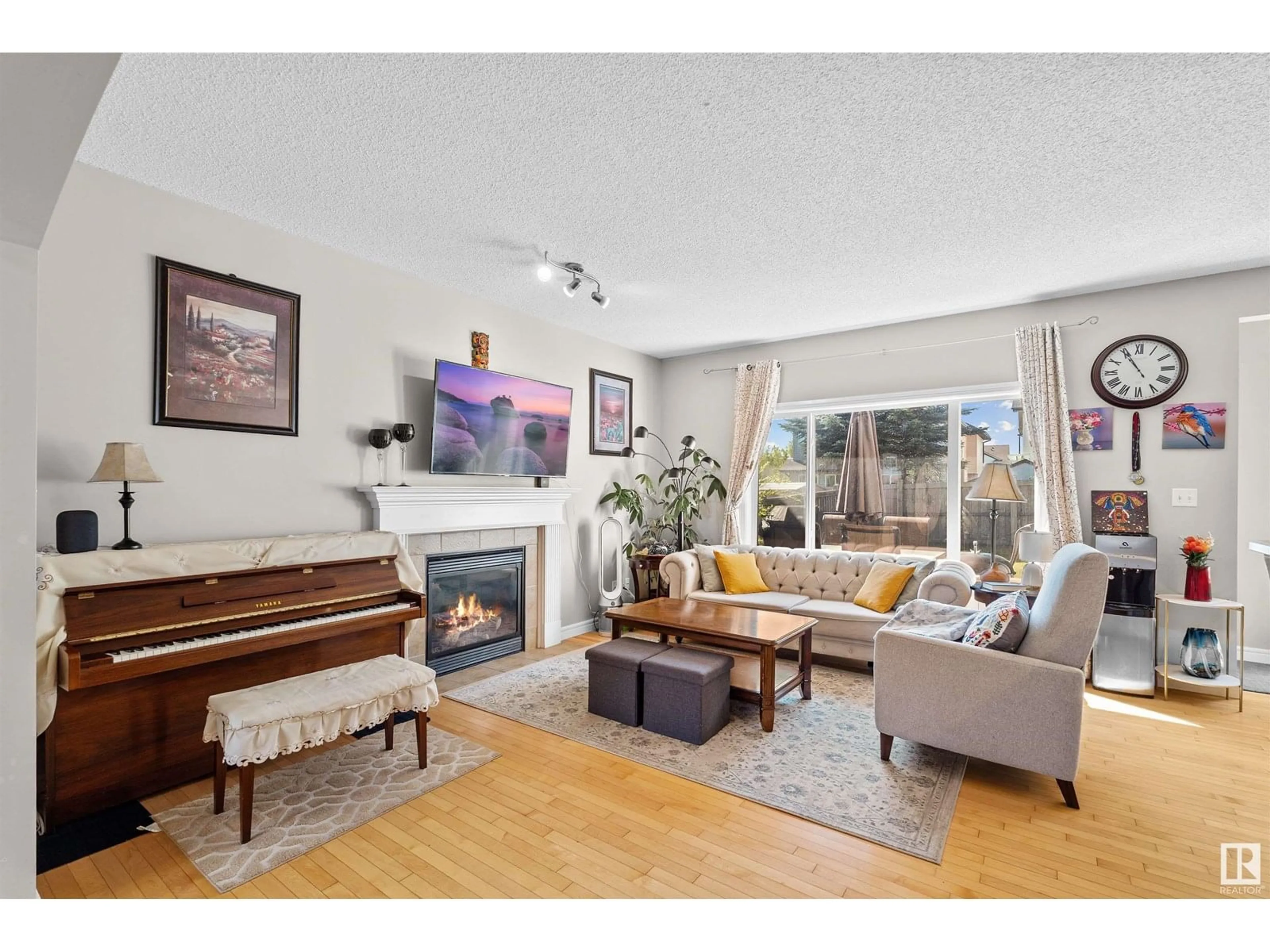 Living room with furniture, wood/laminate floor for 20307 48 AV, Edmonton Alberta T6M2Z6