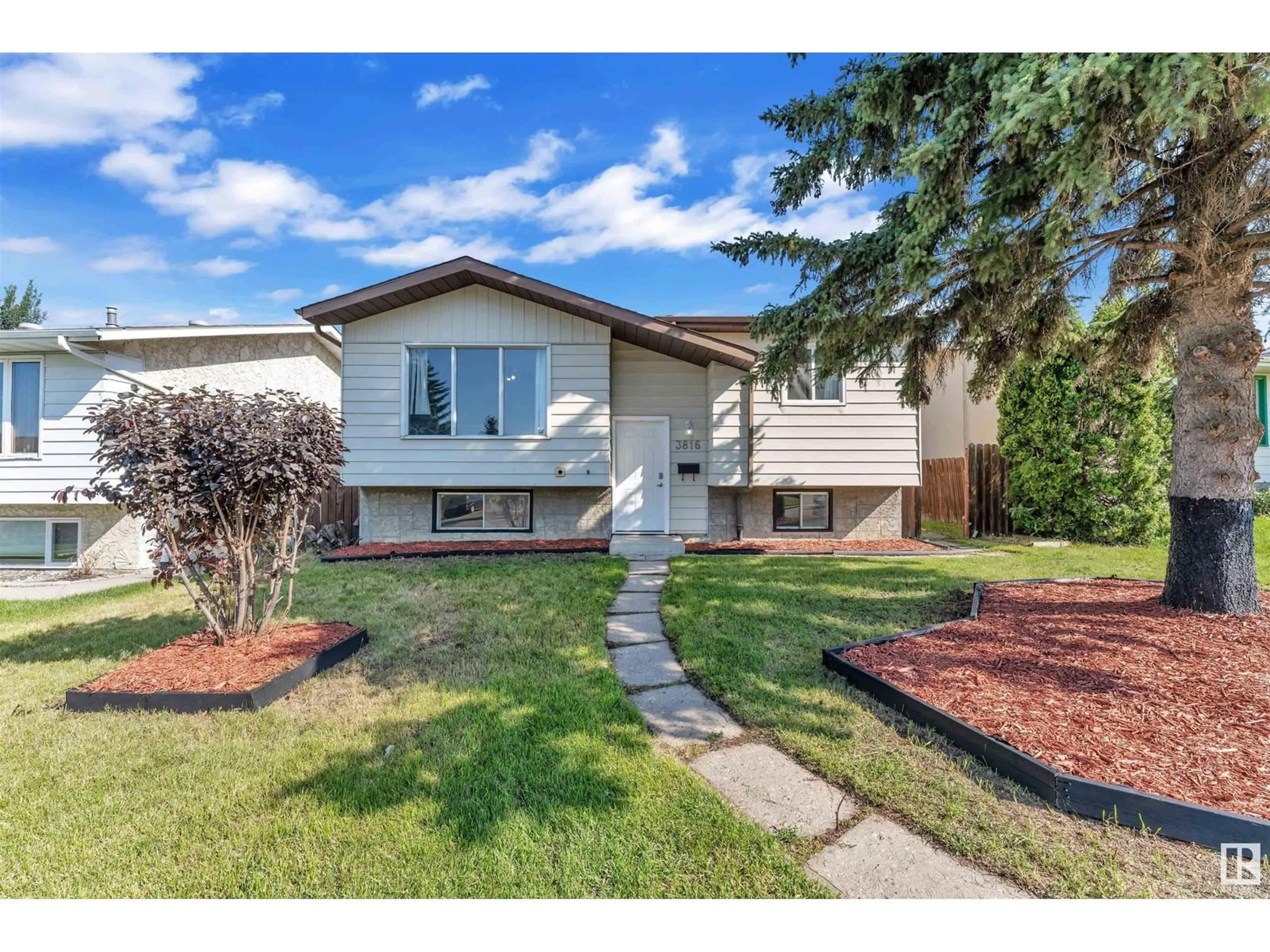 Home with vinyl exterior material, street for NW - 3816 26 AVE, Edmonton Alberta T6L4G5