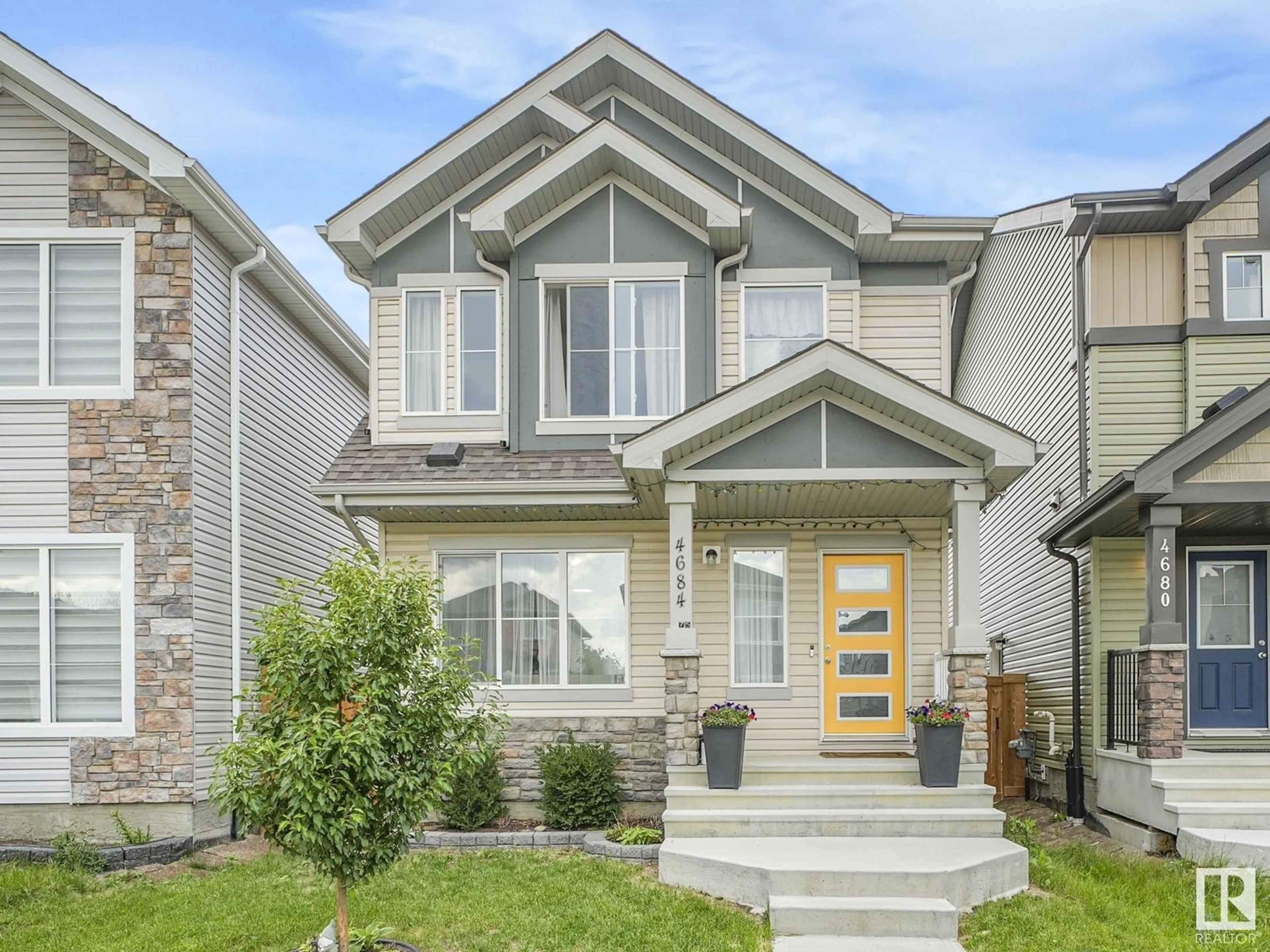 Home with brick exterior material, street for NW - 4684 175 AV, Edmonton Alberta T5Y3Z8