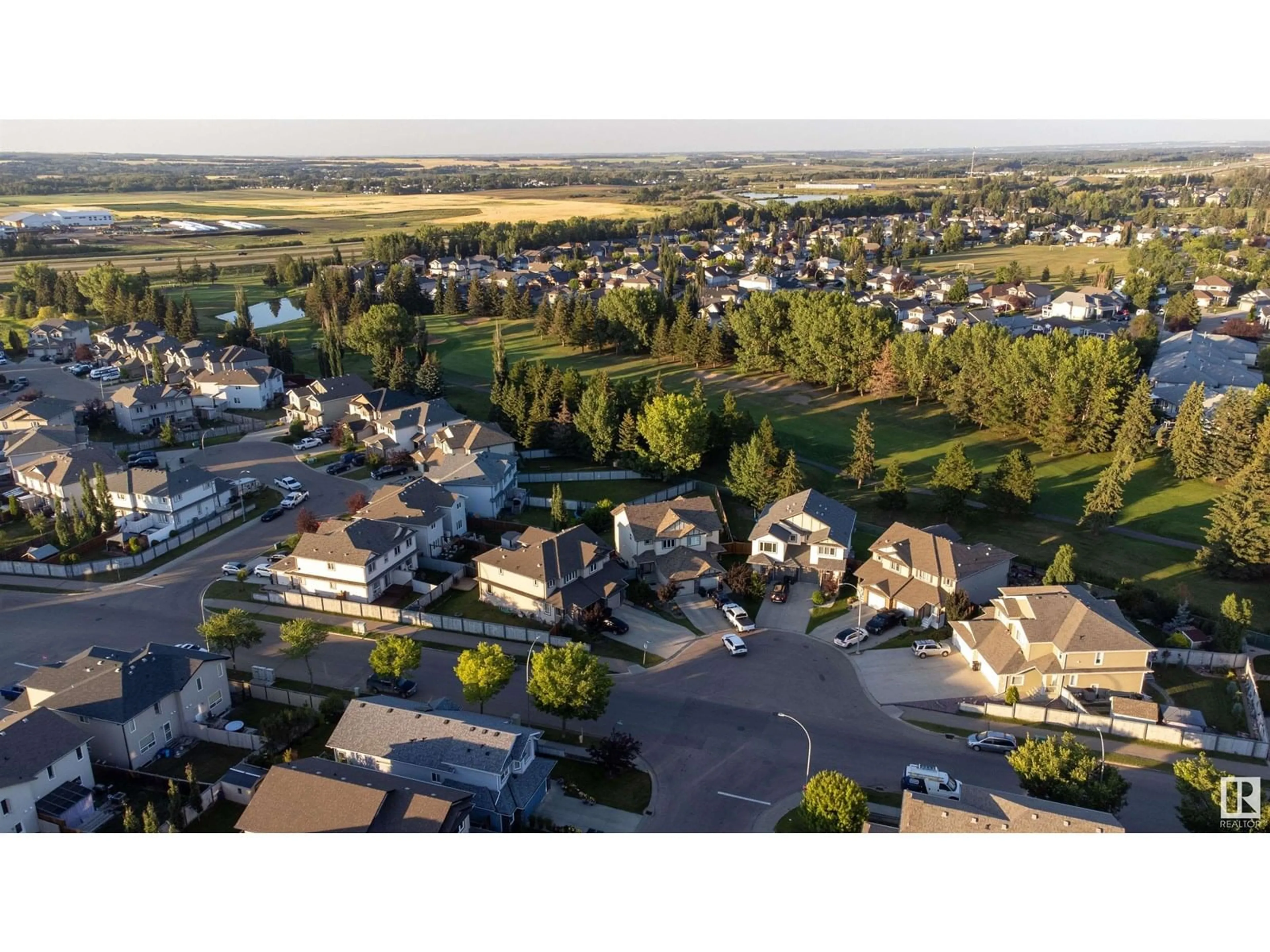 A pic from outside/outdoor area/front of a property/back of a property/a pic from drone, mountain view for 16 ARALIA CV, Spruce Grove Alberta T7X0V4