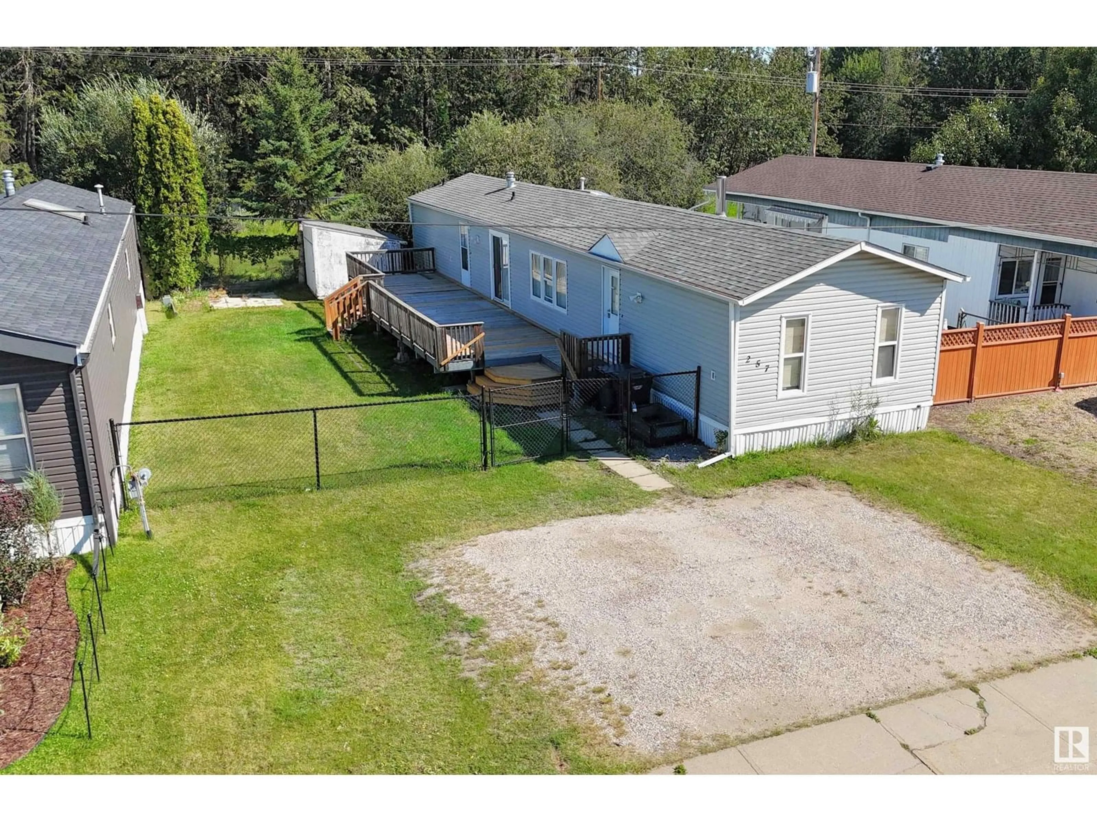 A pic from outside/outdoor area/front of a property/back of a property/a pic from drone, street for #257 - 305 CALAHOO RD, Spruce Grove Alberta T7X3L2