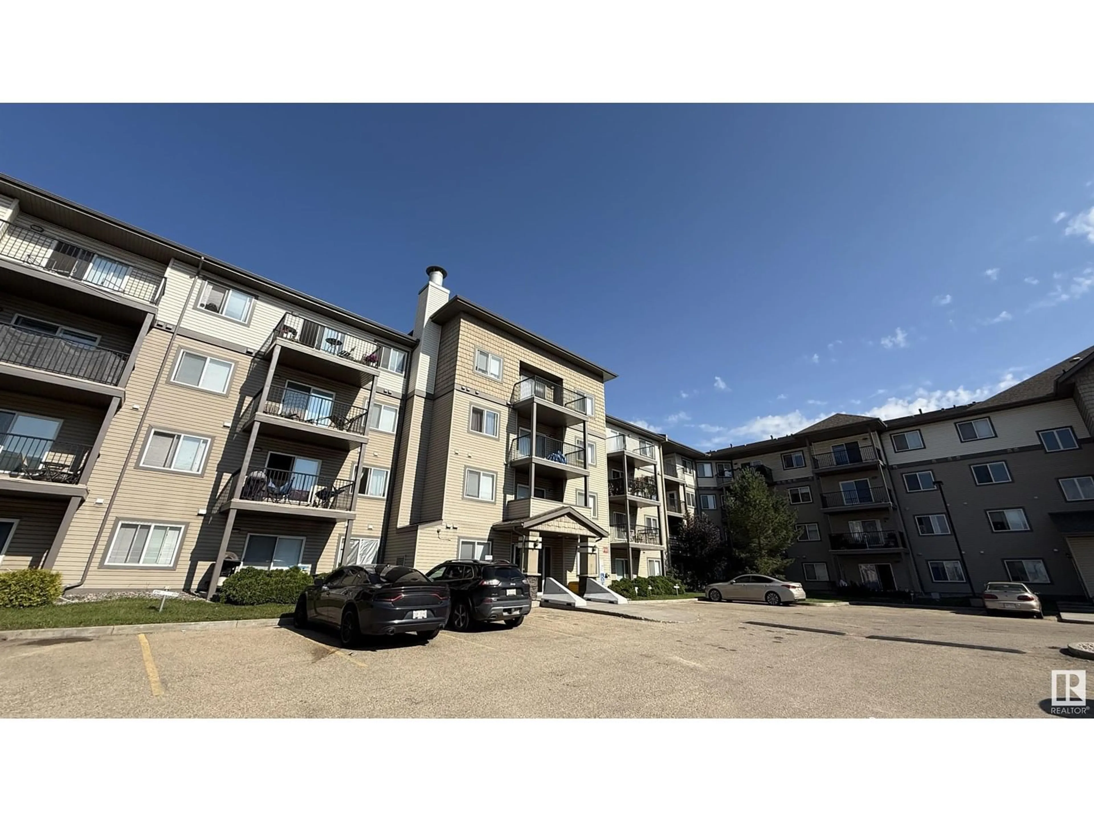 A pic from outside/outdoor area/front of a property/back of a property/a pic from drone, building for 301 - 129 CLAREVIEW STATION DR DR, Edmonton Alberta T5Y0J4