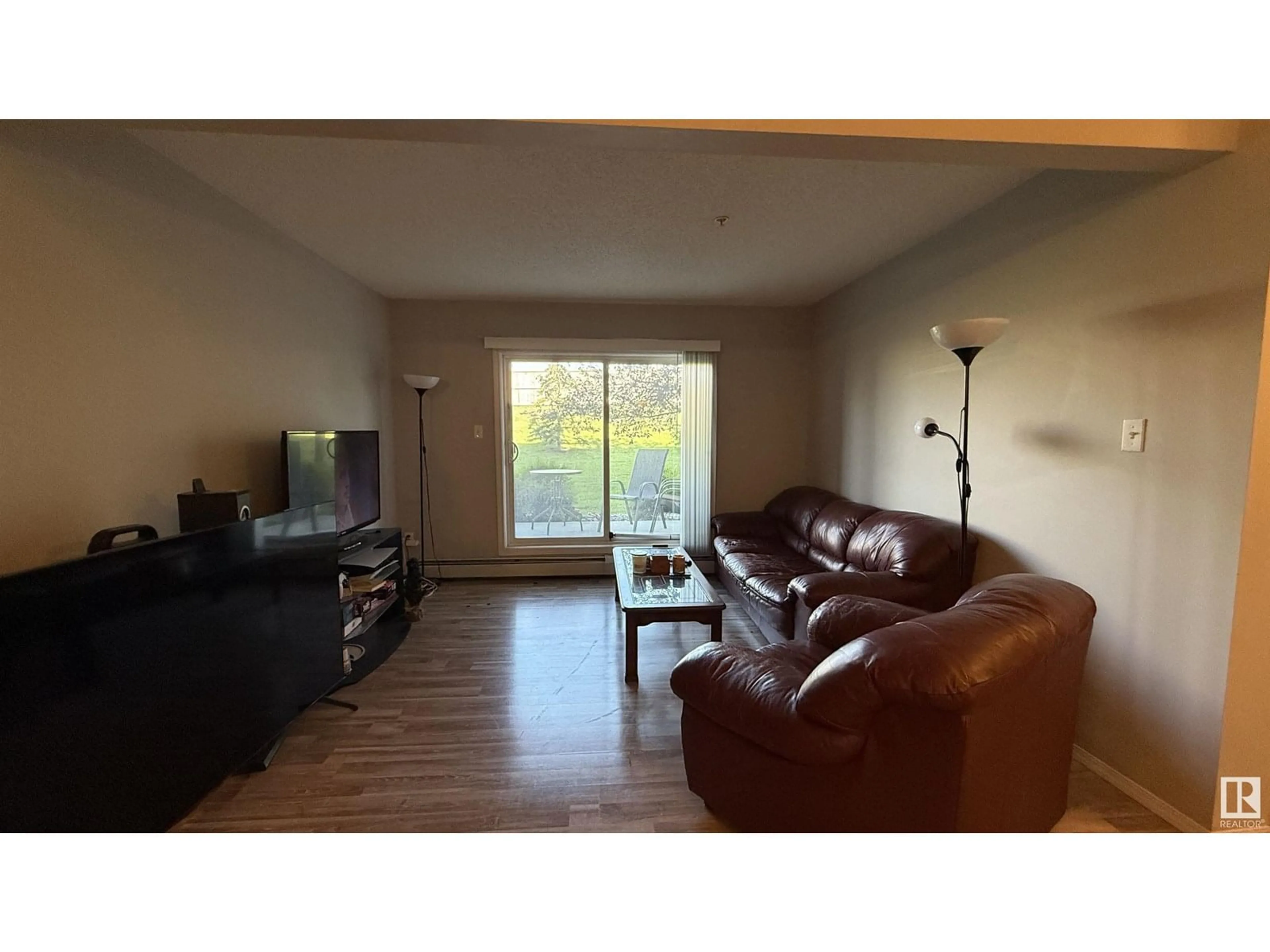 Living room with furniture, unknown for 301 - 129 CLAREVIEW STATION DR DR, Edmonton Alberta T5Y0J4