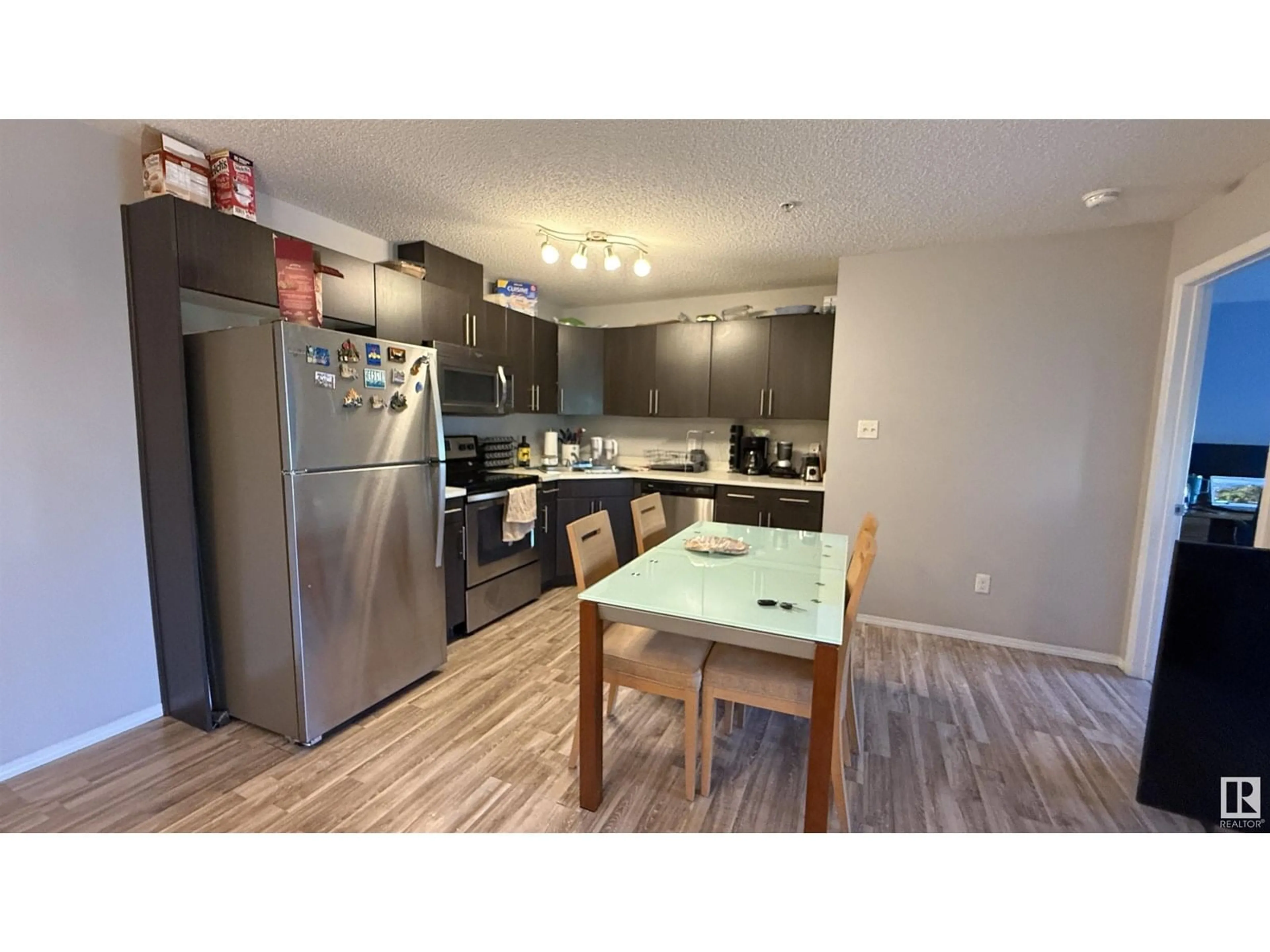 Standard kitchen, wood/laminate floor for 301 - 129 CLAREVIEW STATION DR DR, Edmonton Alberta T5Y0J4