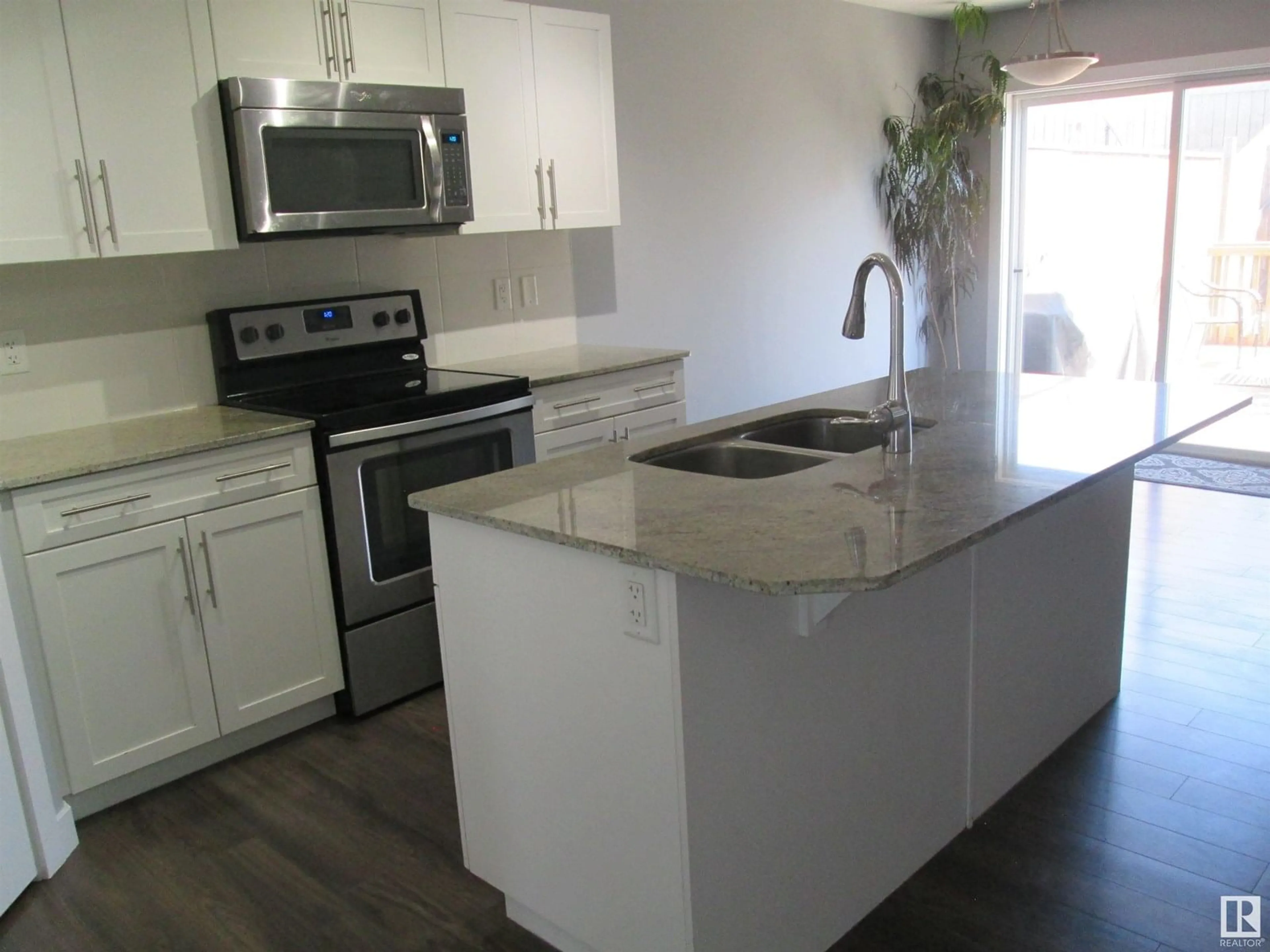 Open concept kitchen, unknown for NW - 9851 217 ST, Edmonton Alberta T5T4T7