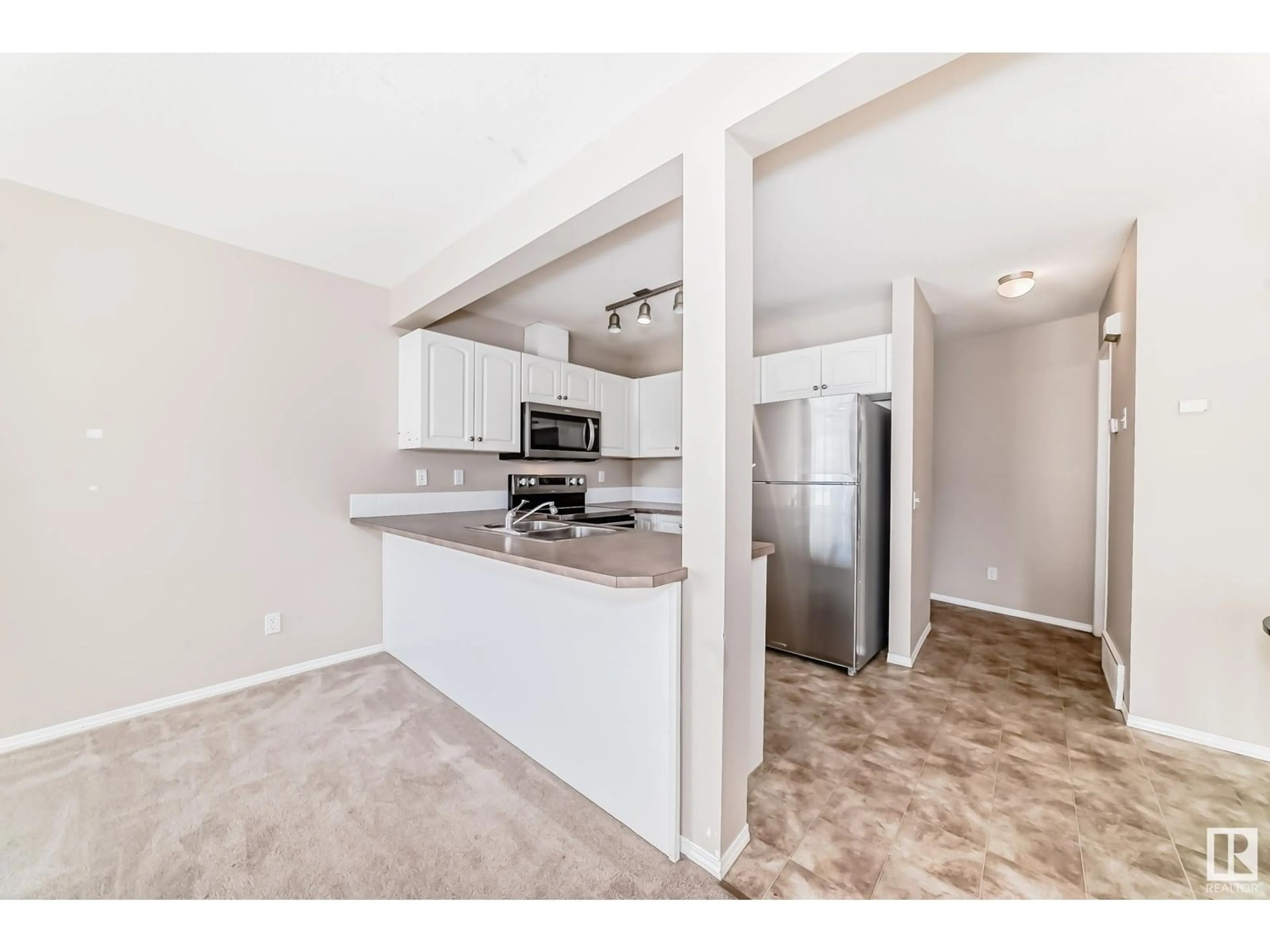 Open concept kitchen, unknown for #196 - 230 EDWARDS DR, Edmonton Alberta T6X1G7