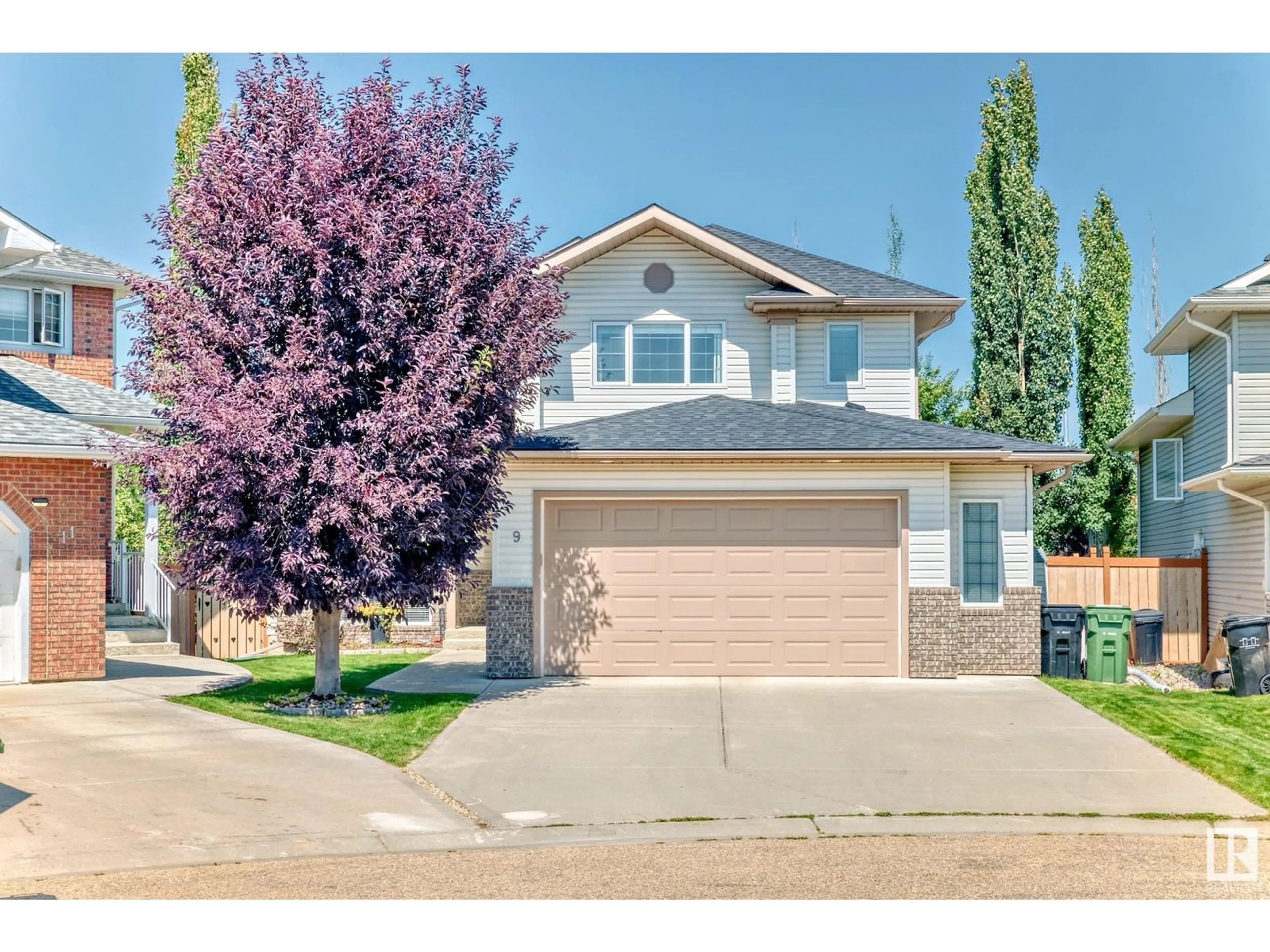 Home with vinyl exterior material, street for 9 WILKINSON PL, Leduc Alberta T9E8N1