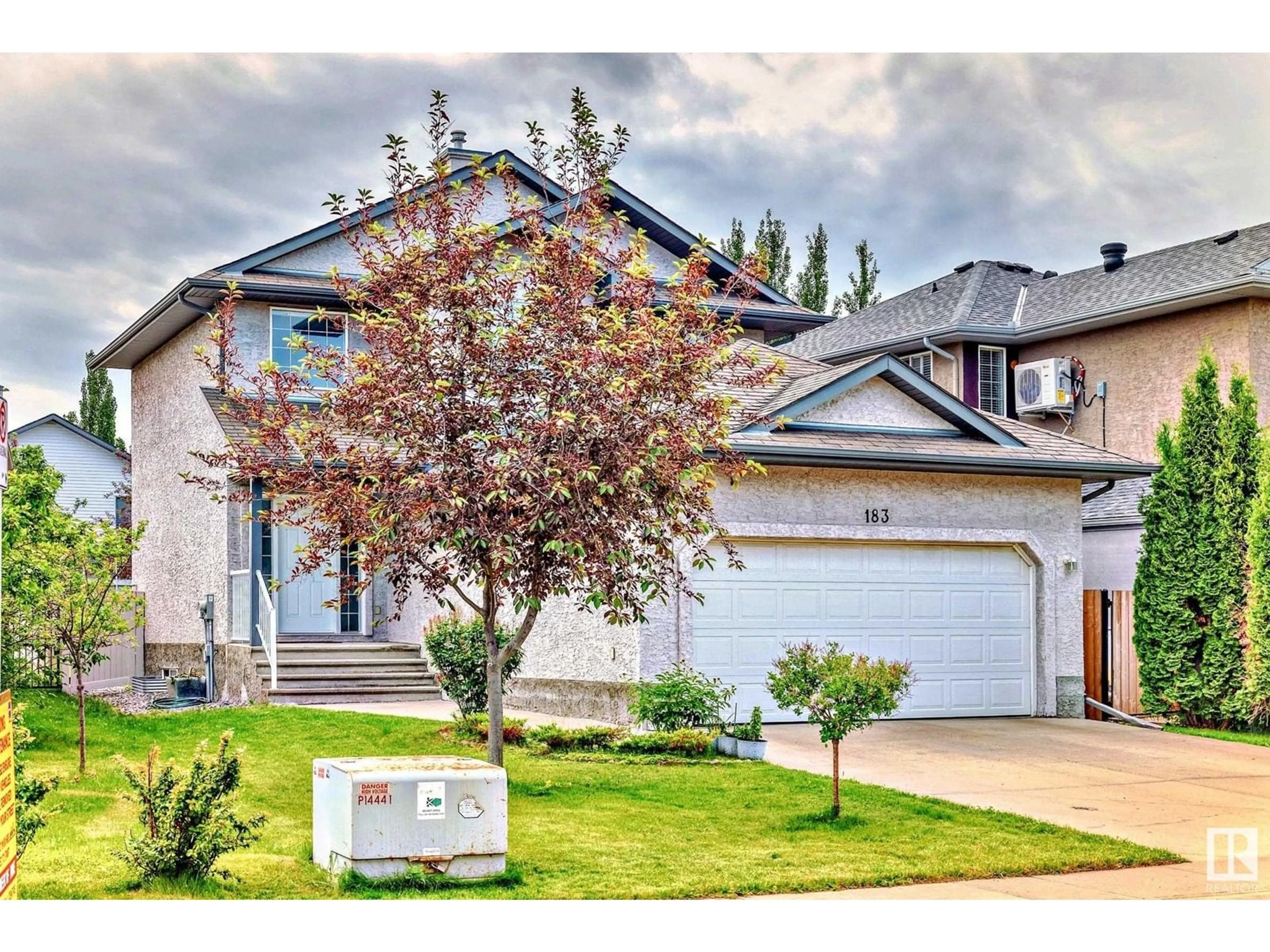 Home with vinyl exterior material, street for 183 CASTLE DR, Edmonton Alberta T5X6G4