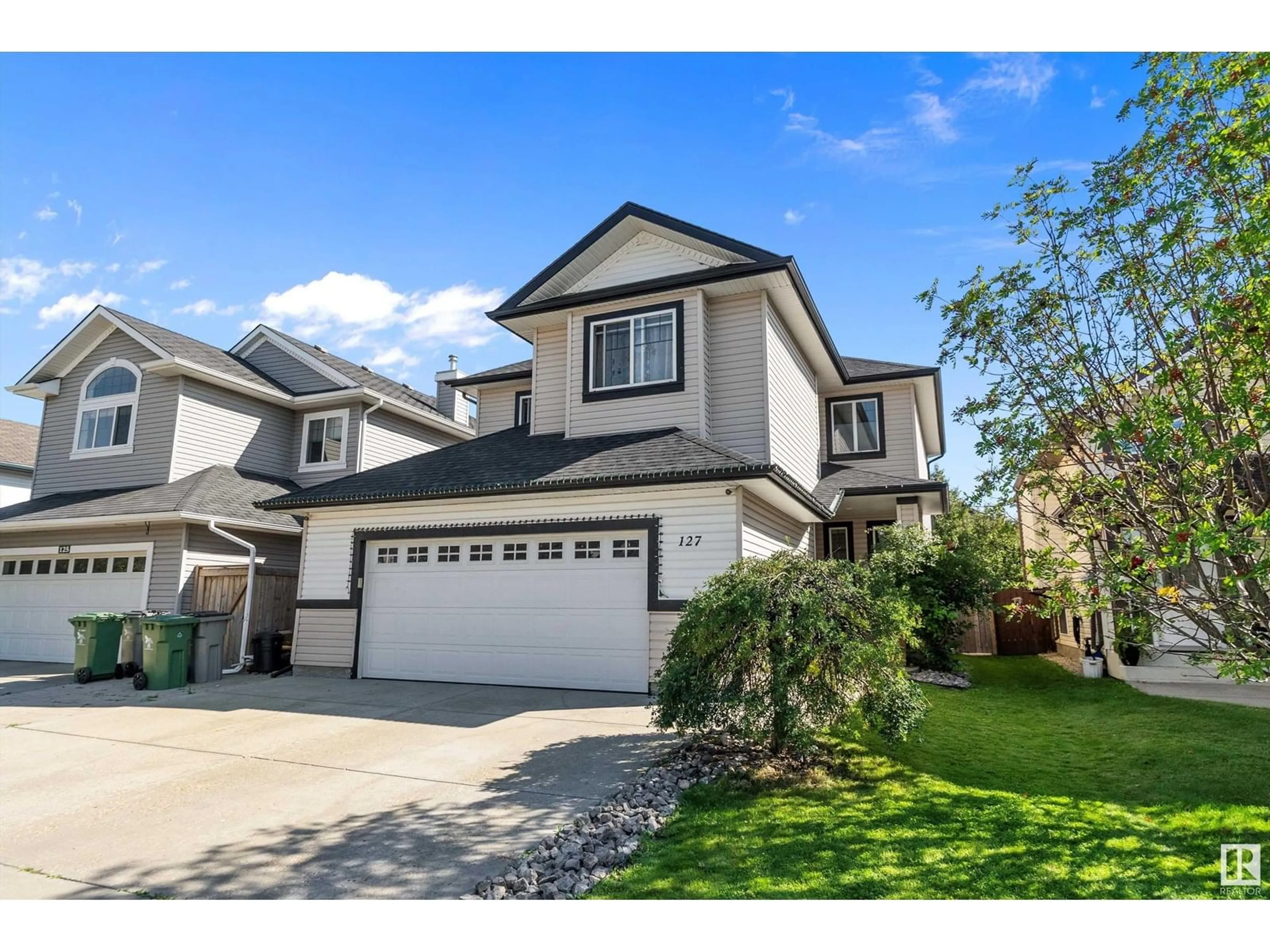 Home with vinyl exterior material, street for 127 RUE MARQUET, Beaumont Alberta T4X1W3