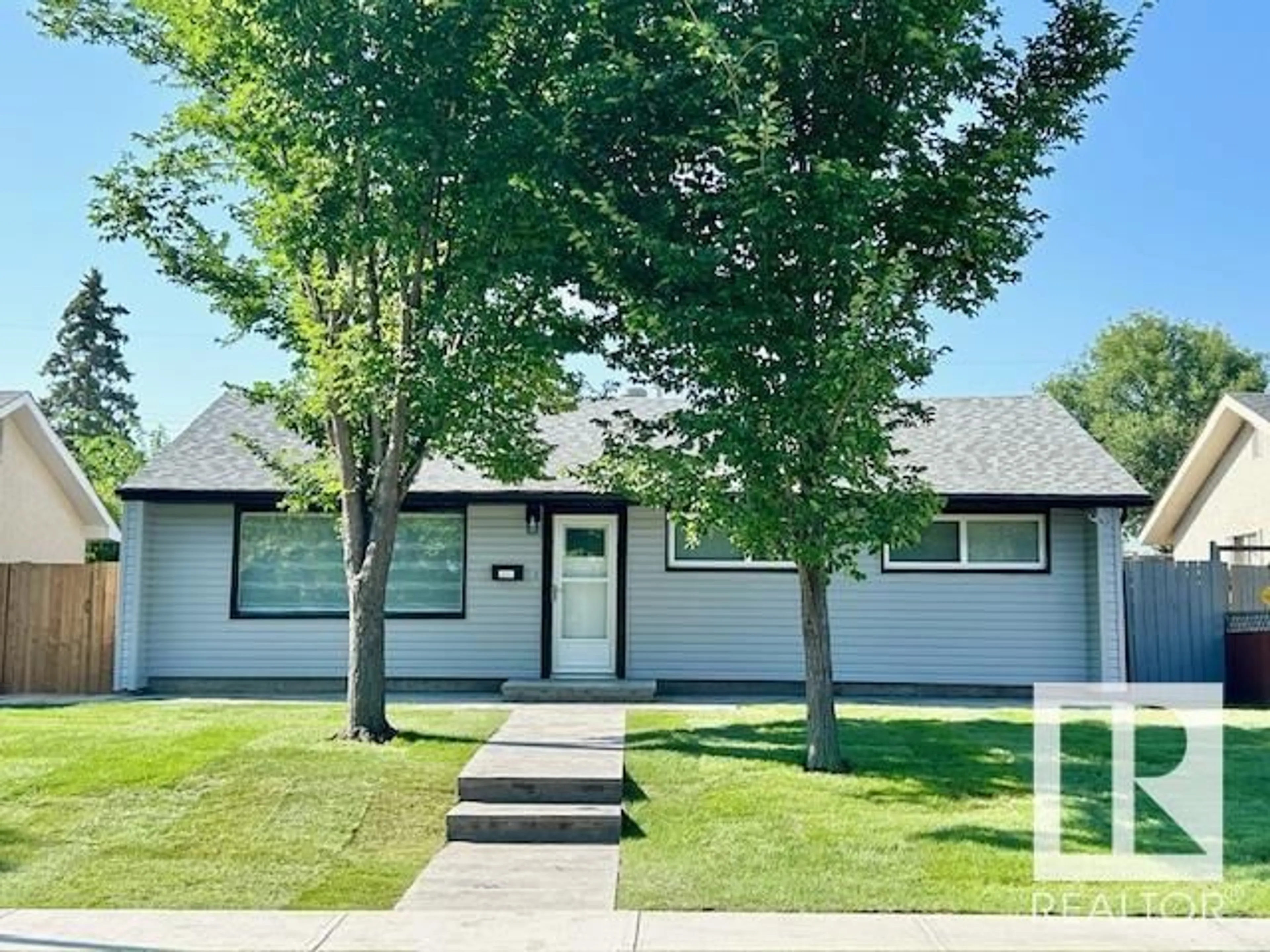Home with vinyl exterior material, street for 8811 130A AV, Edmonton Alberta T5E0V7