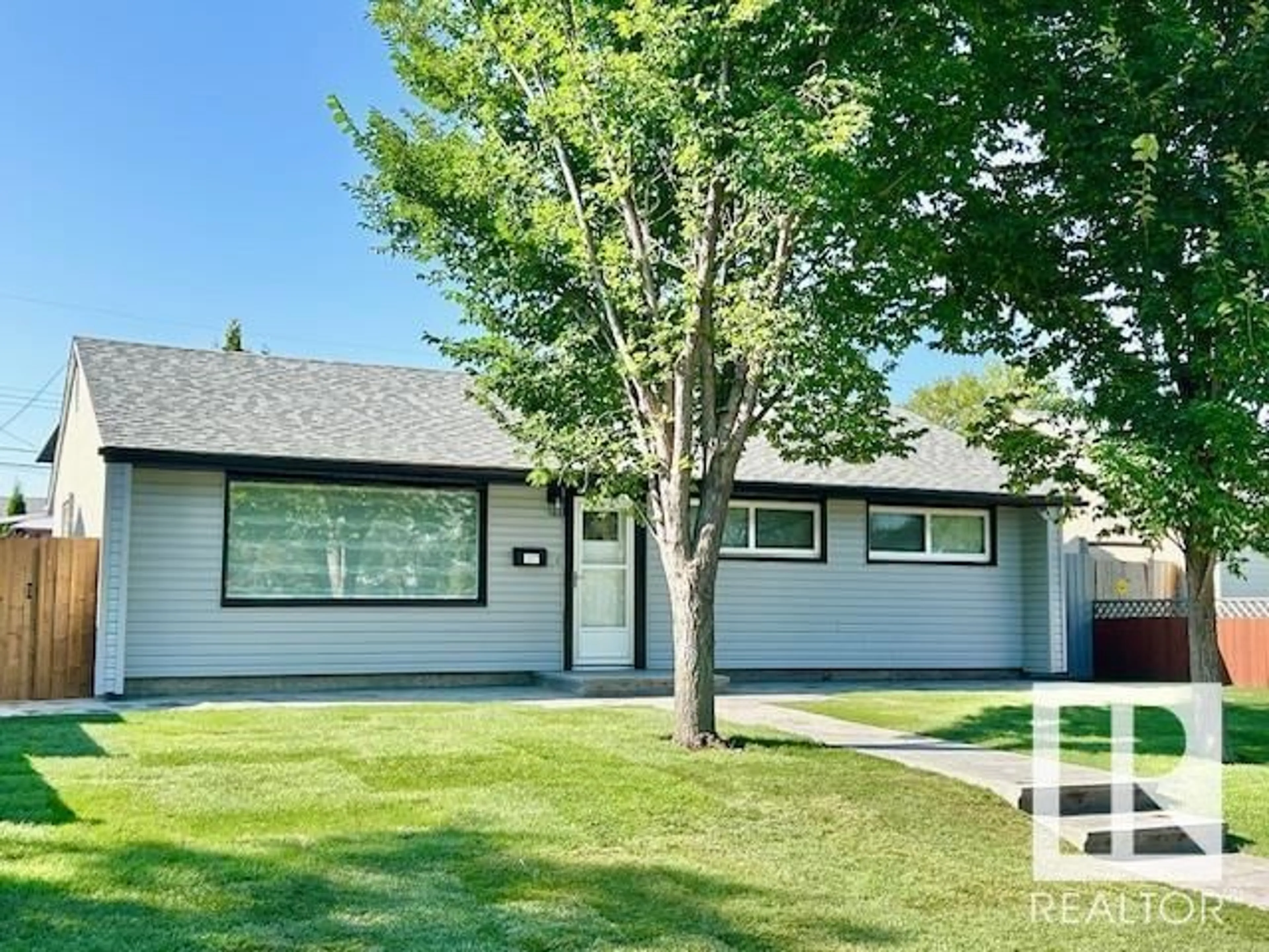 Home with vinyl exterior material, street for 8811 130A AV, Edmonton Alberta T5E0V7