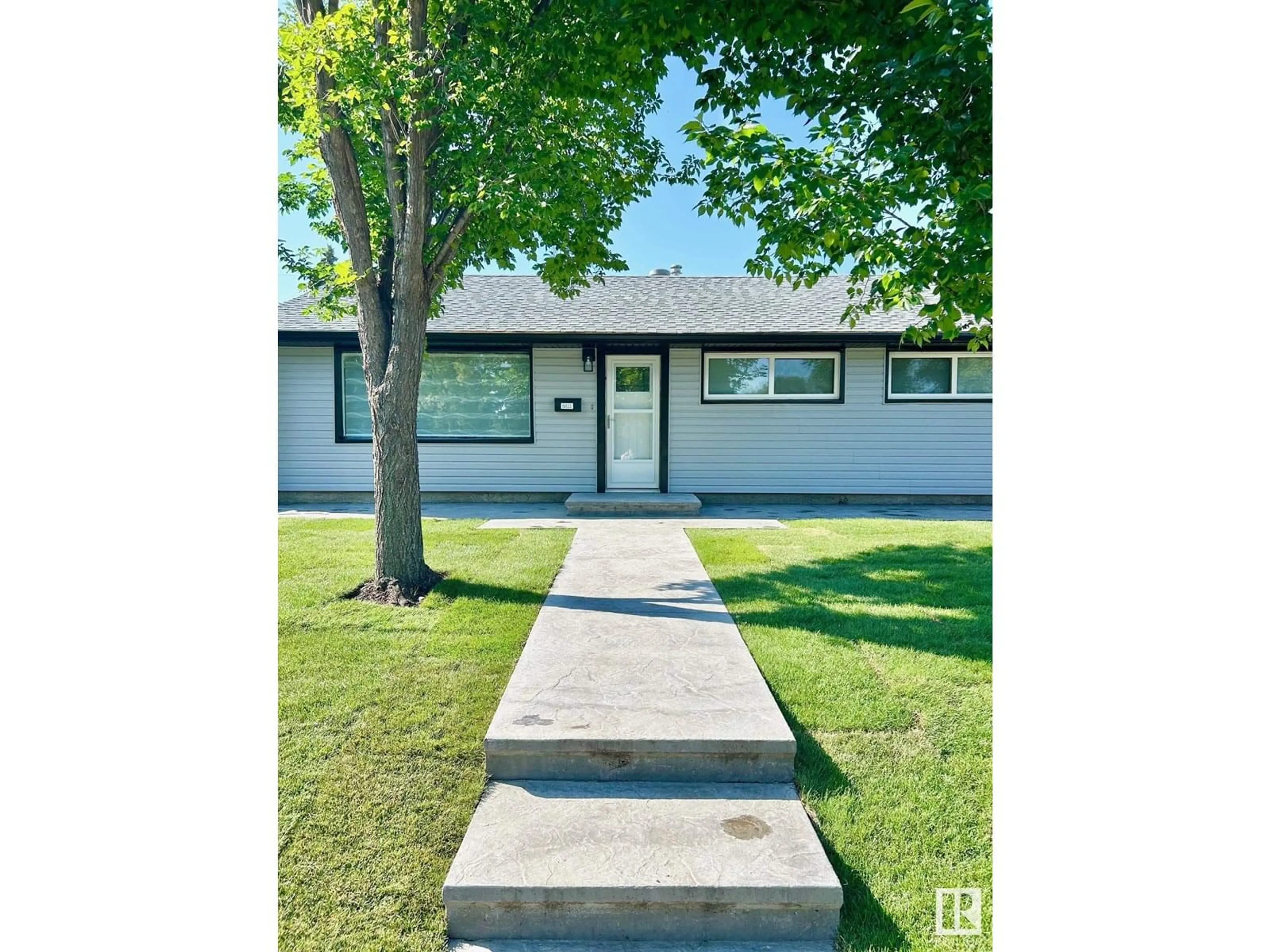 Home with vinyl exterior material, street for 8811 130A AV, Edmonton Alberta T5E0V7