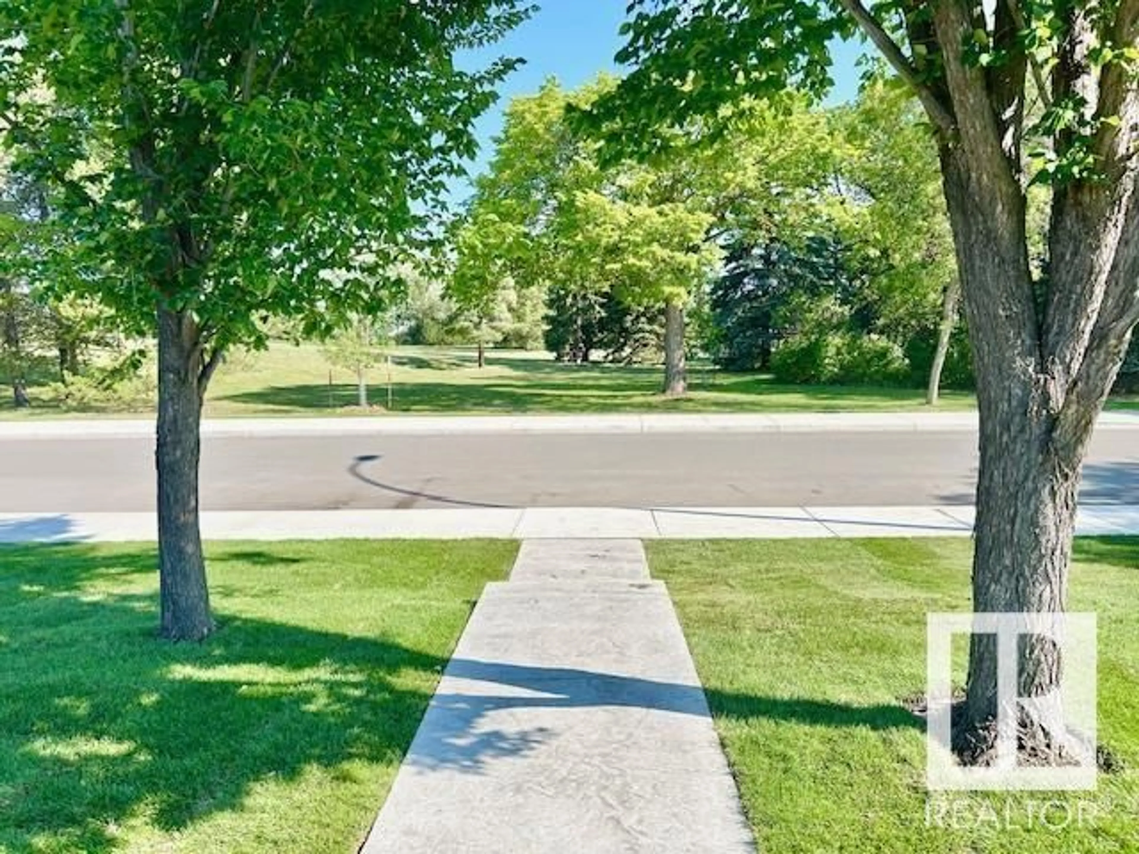A pic from outside/outdoor area/front of a property/back of a property/a pic from drone, street for 8811 130A AV, Edmonton Alberta T5E0V7