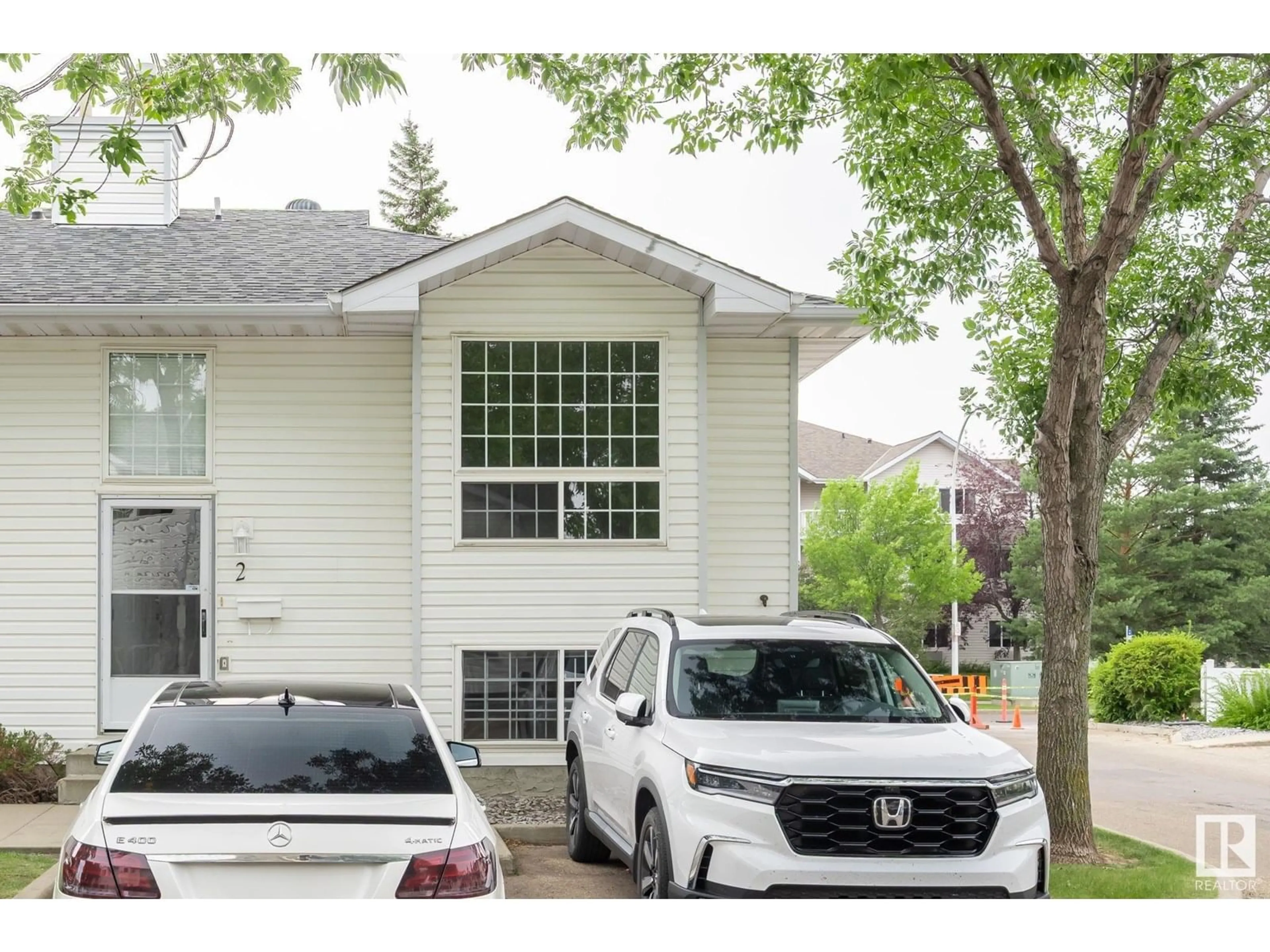 Home with vinyl exterior material, street for #2 - 3311 58 ST, Edmonton Alberta T6L6X3