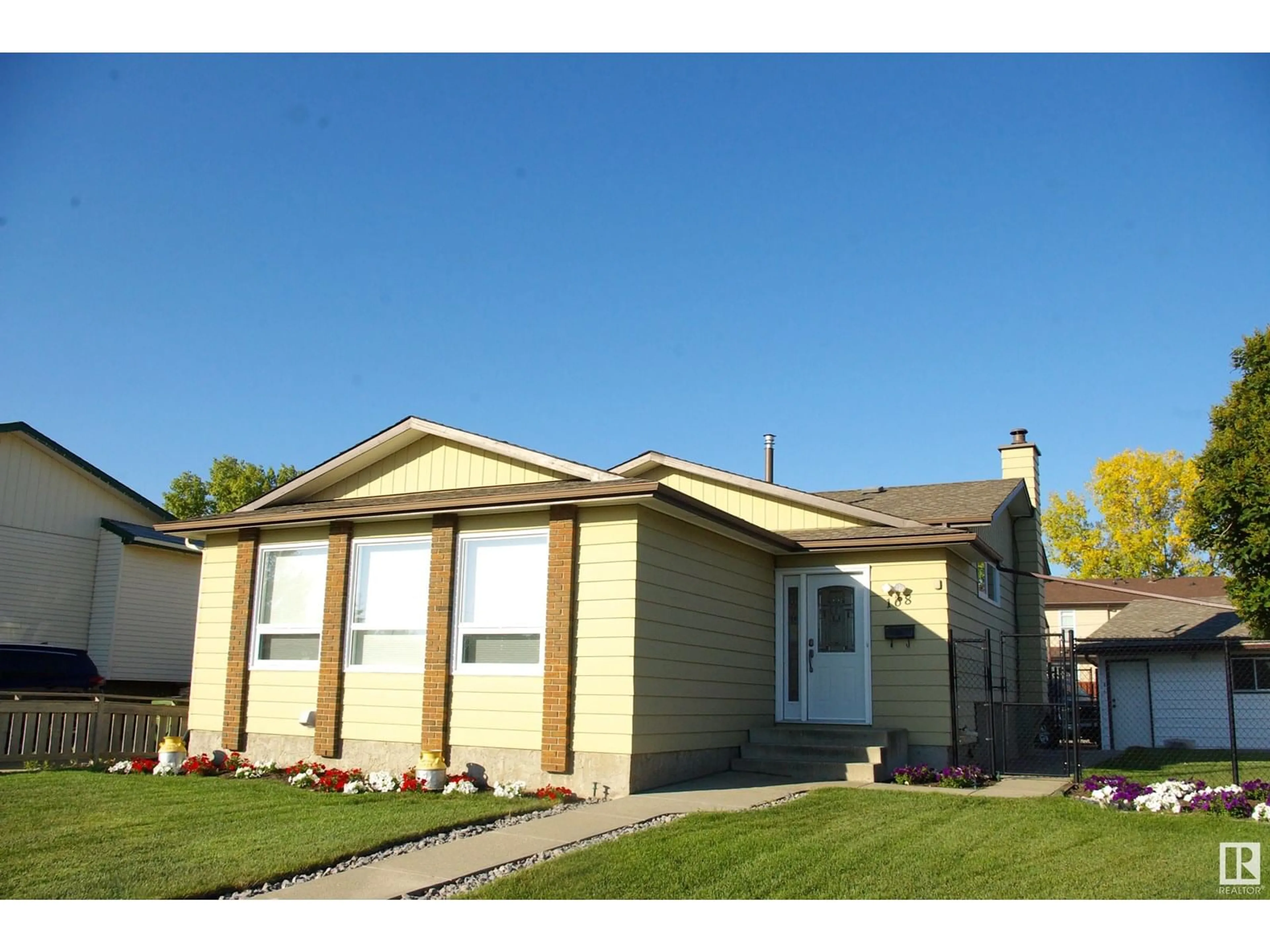 Home with vinyl exterior material, street for 168 WARWICK RD, Edmonton Alberta T5X4P8