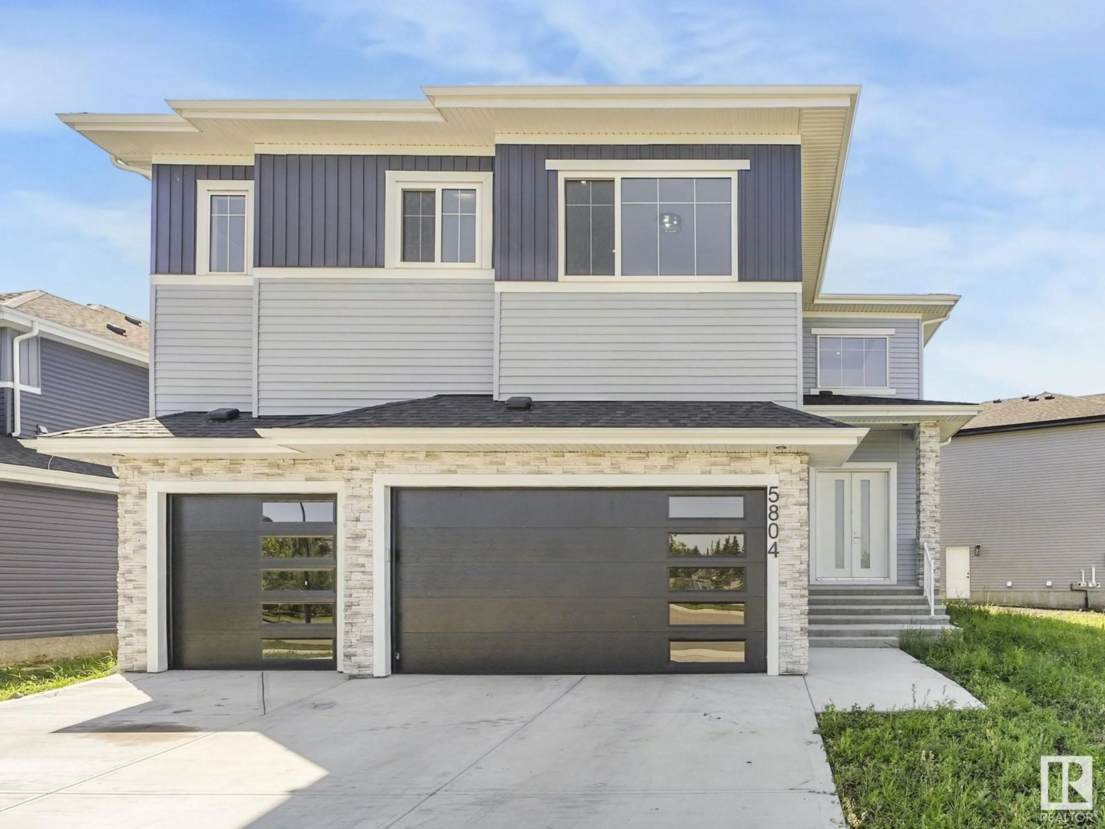 Home with vinyl exterior material, street for 5804 SOLEIL BV, Beaumont Alberta T4X2X9