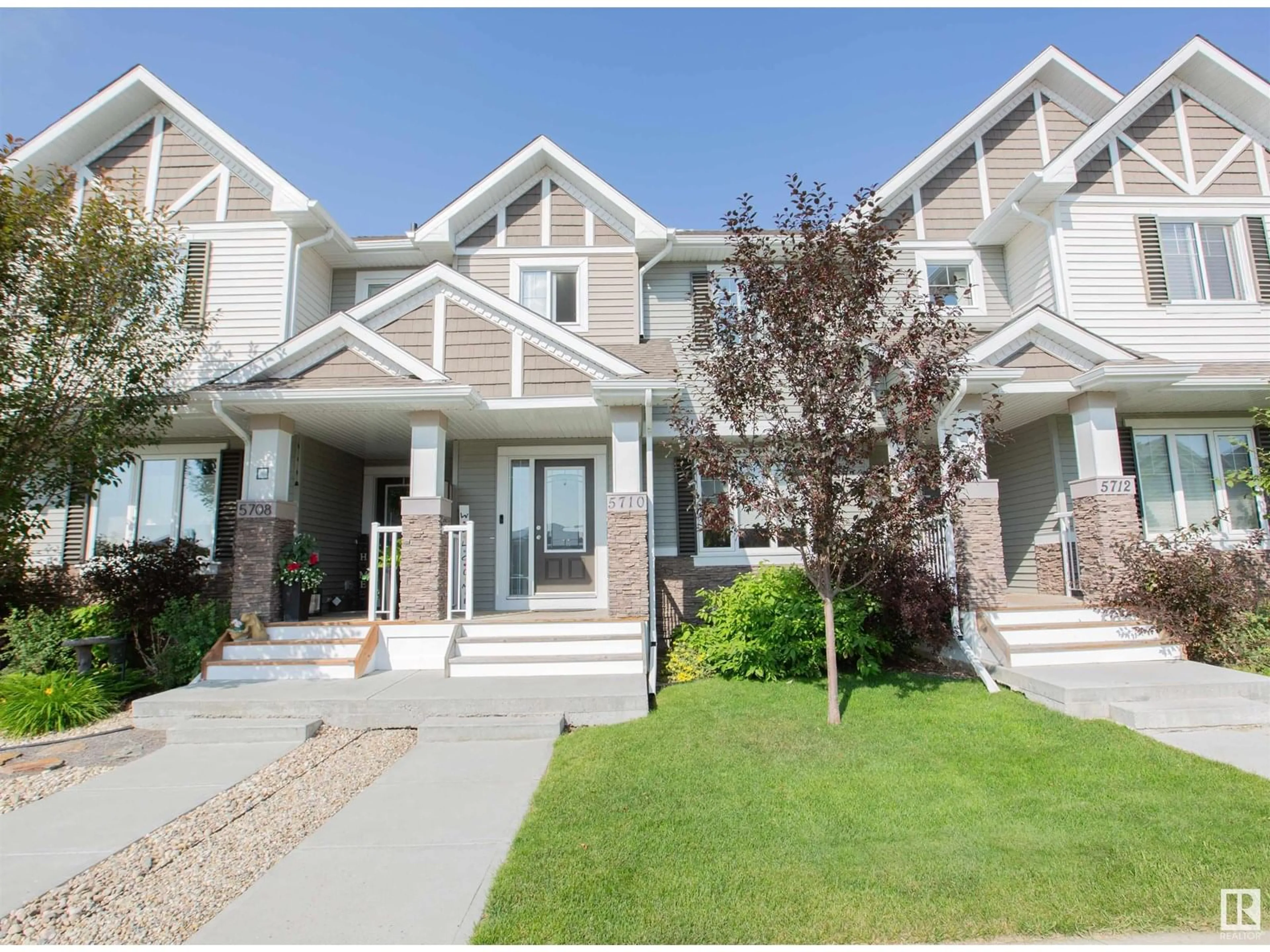 Home with vinyl exterior material, street for 5710 65 ST, Beaumont Alberta T4X2A4