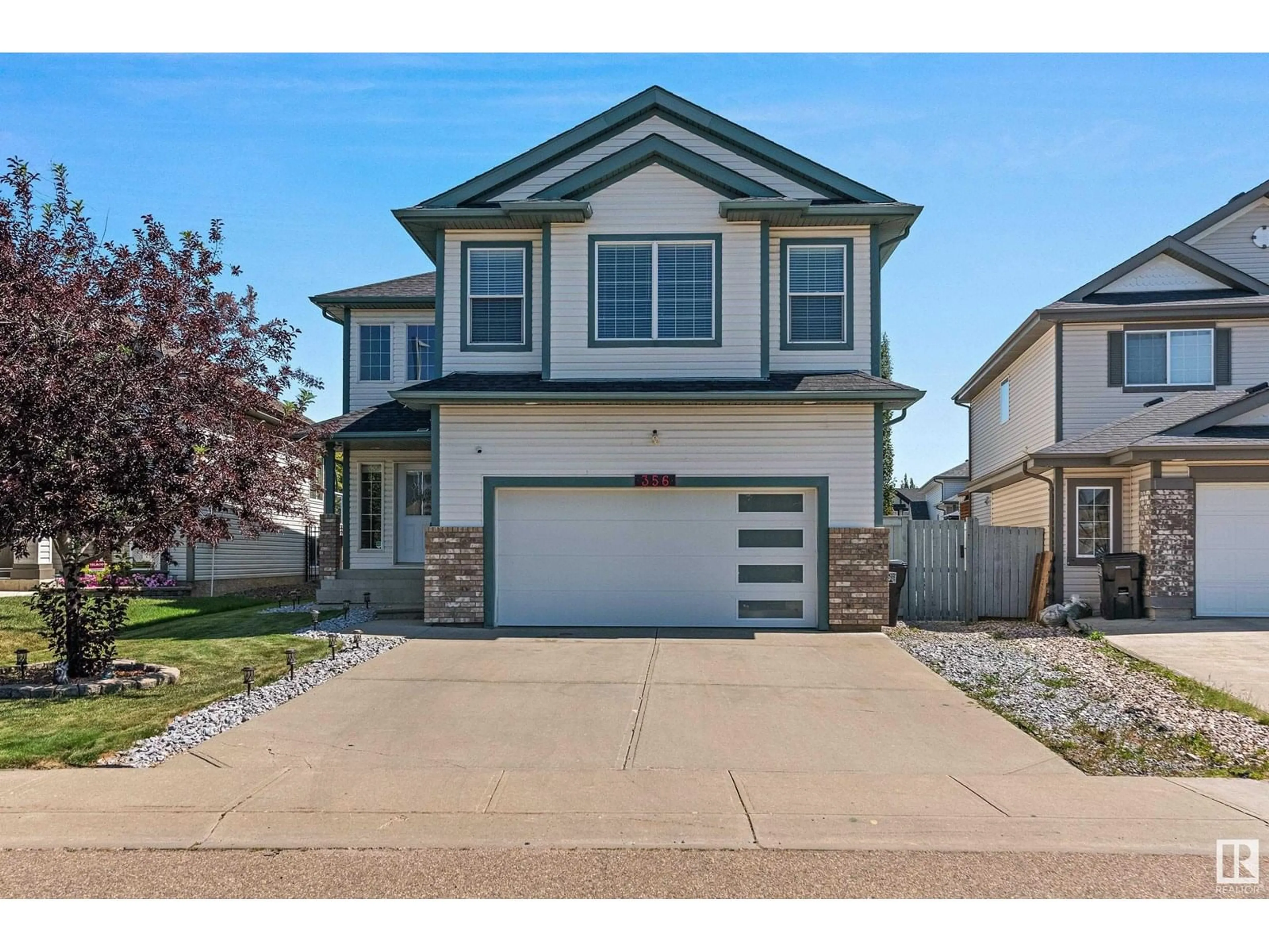 Home with vinyl exterior material, street for 356 CALDERON CR, Edmonton Alberta T6V1R8