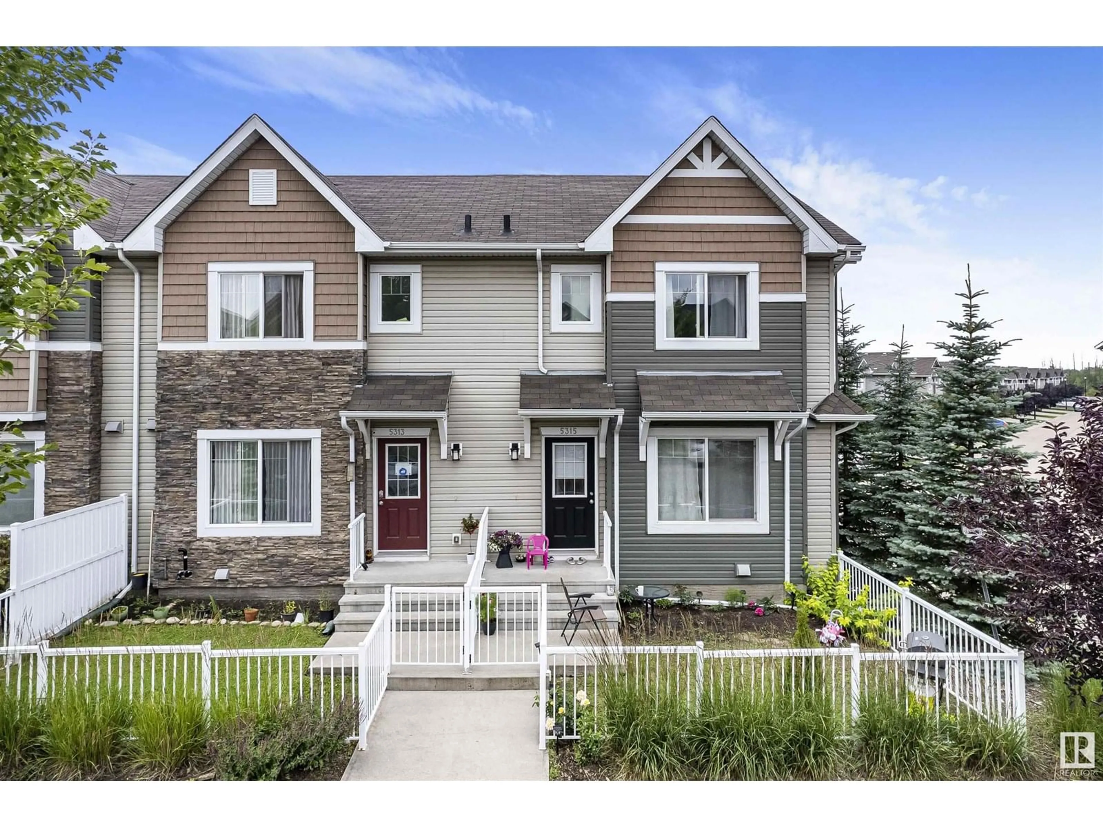 Home with vinyl exterior material, street for 5313 3 AV SW, Edmonton Alberta T6X0W7