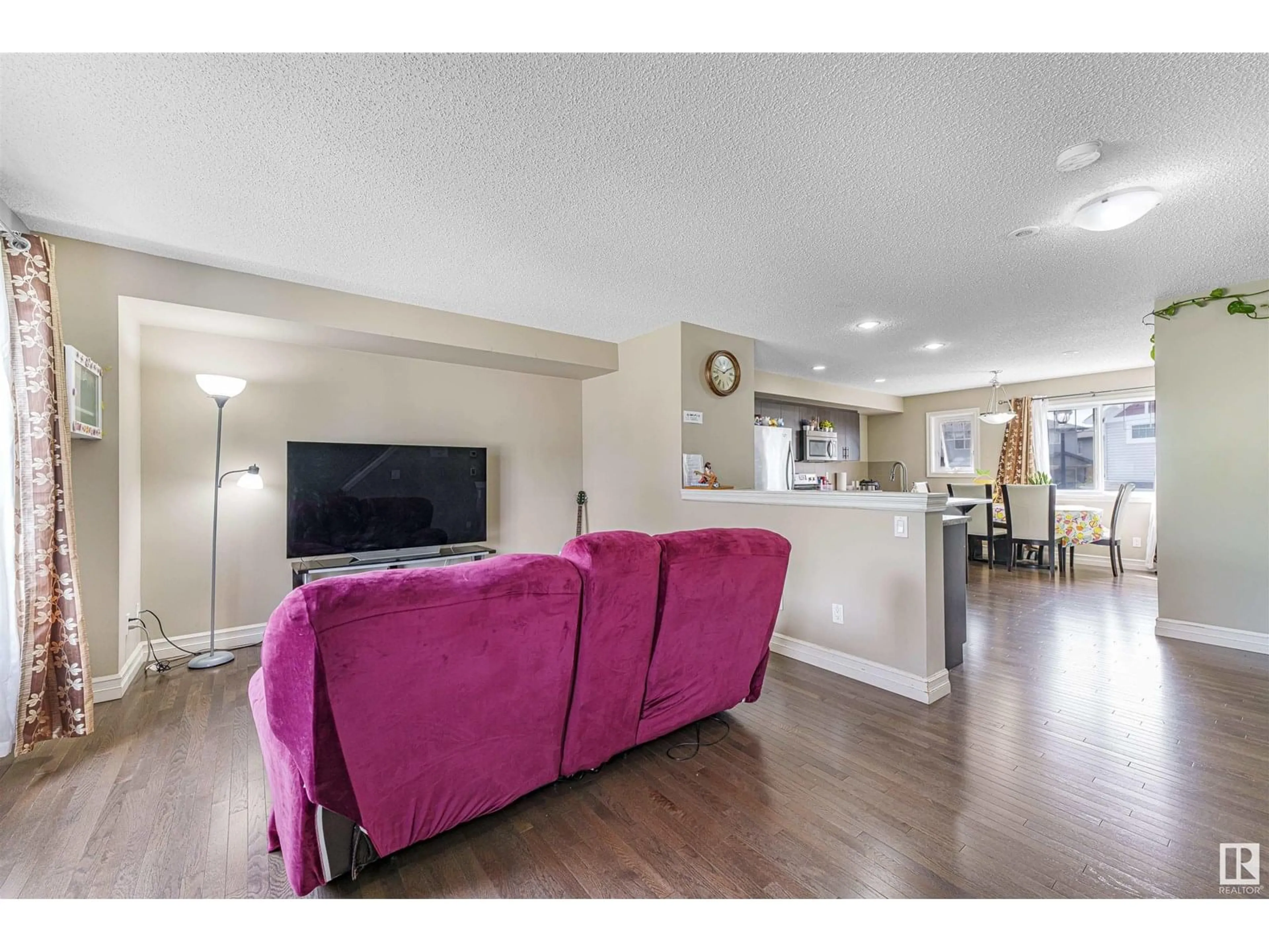 Living room with furniture, unknown for 5313 3 AV SW, Edmonton Alberta T6X0W7