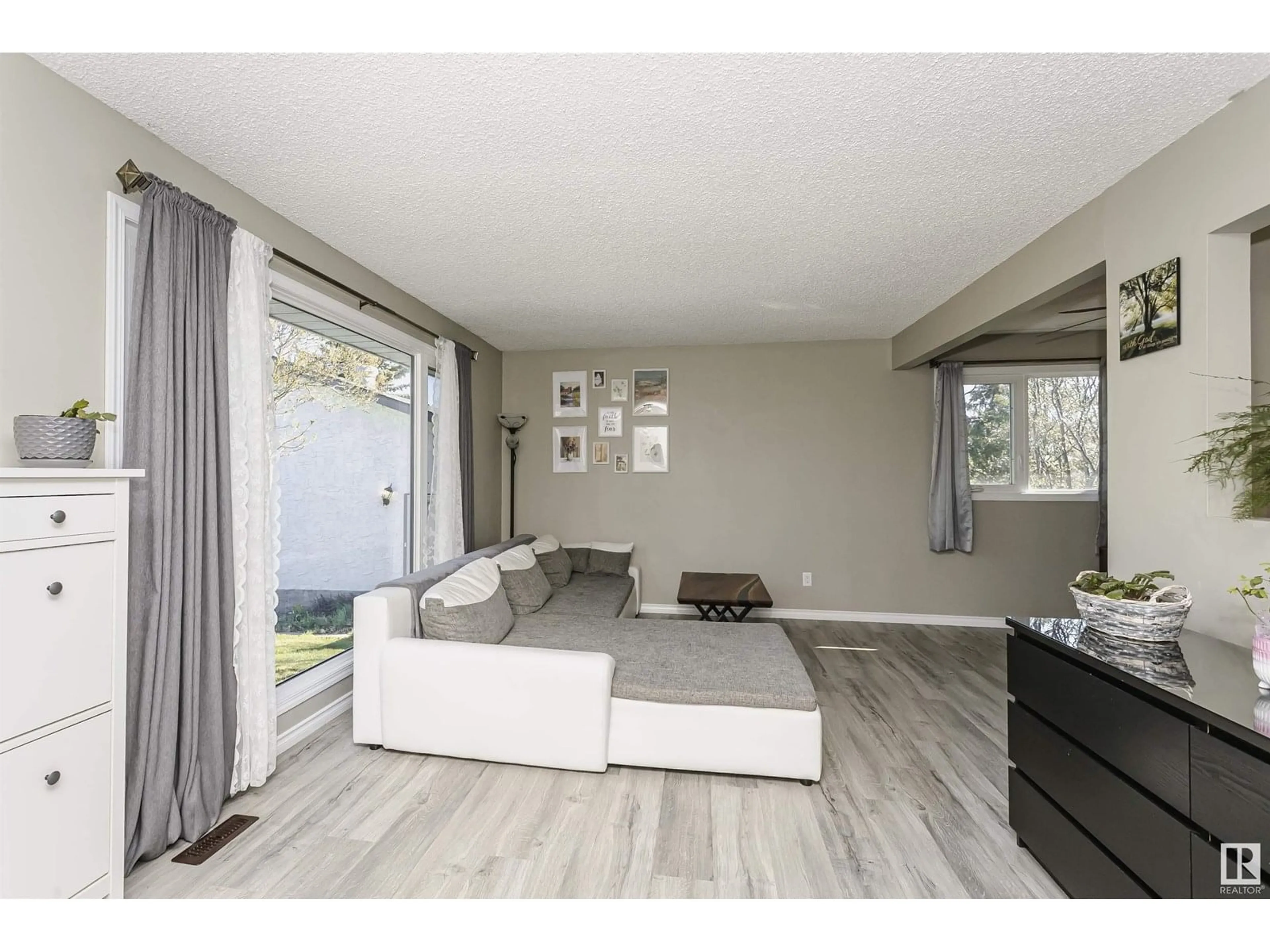 Living room with furniture, wood/laminate floor for 129 DIAMOND DR, Millet Alberta T0C1Z0