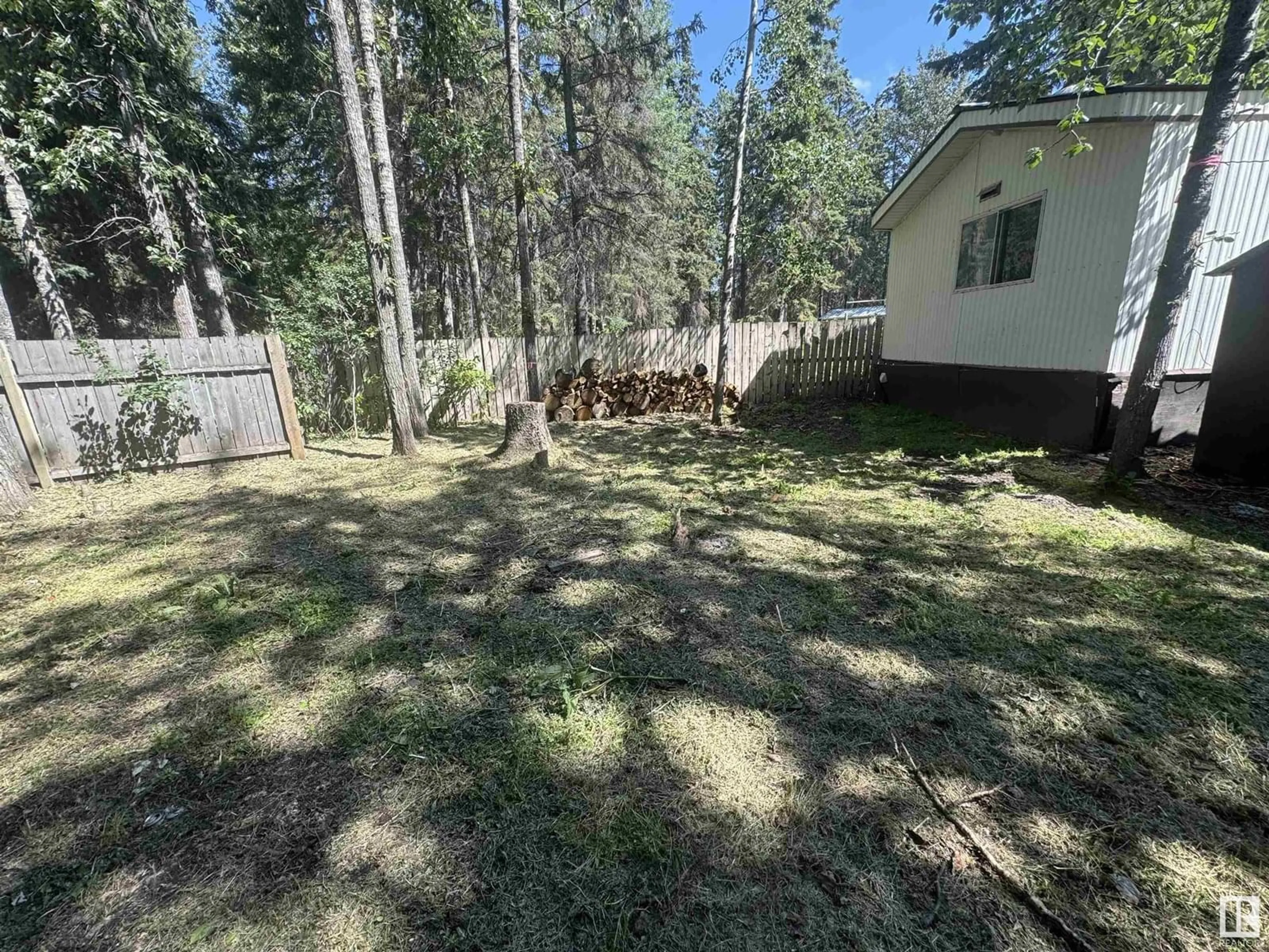 A pic from outside/outdoor area/front of a property/back of a property/a pic from drone, forest/trees view for 5002 56ave - 60 GREENWOOD MHP, Drayton Valley Alberta T7A1M6