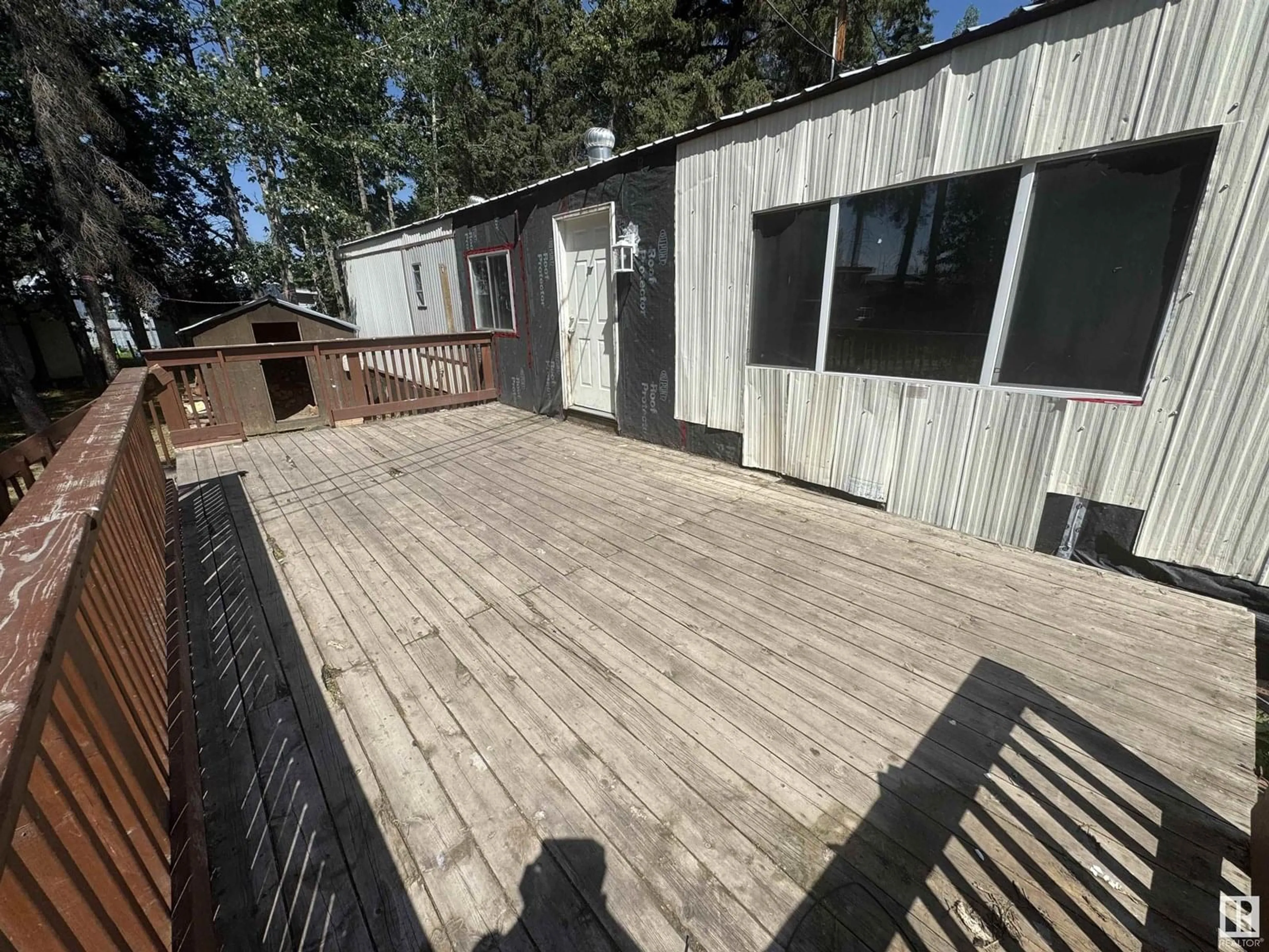 A pic from outside/outdoor area/front of a property/back of a property/a pic from drone, unknown for 5002 56ave - 60 GREENWOOD MHP, Drayton Valley Alberta T7A1M6