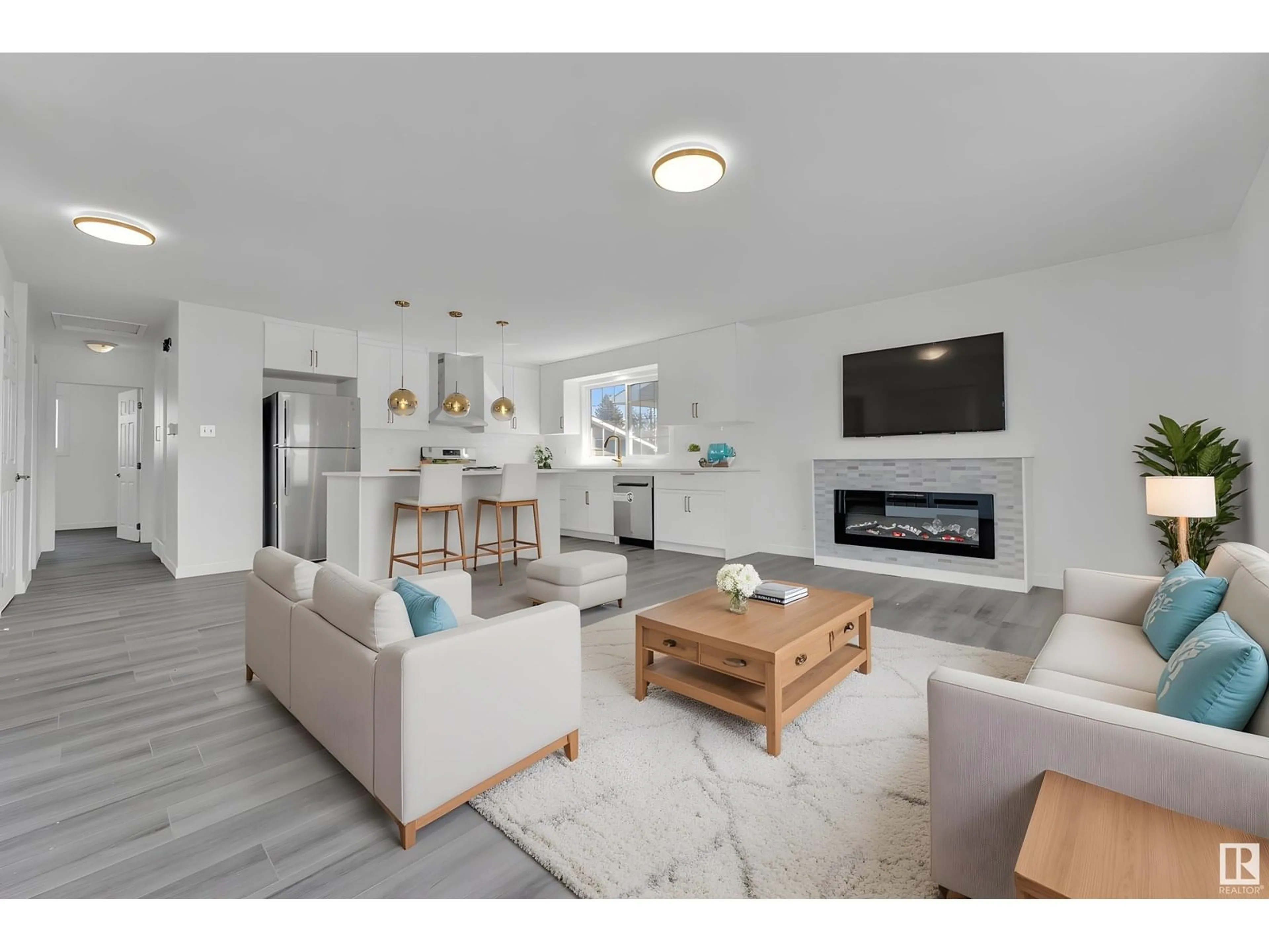 Open concept kitchen, wood/laminate floor for 8004 130 AV, Edmonton Alberta T5C1Y5