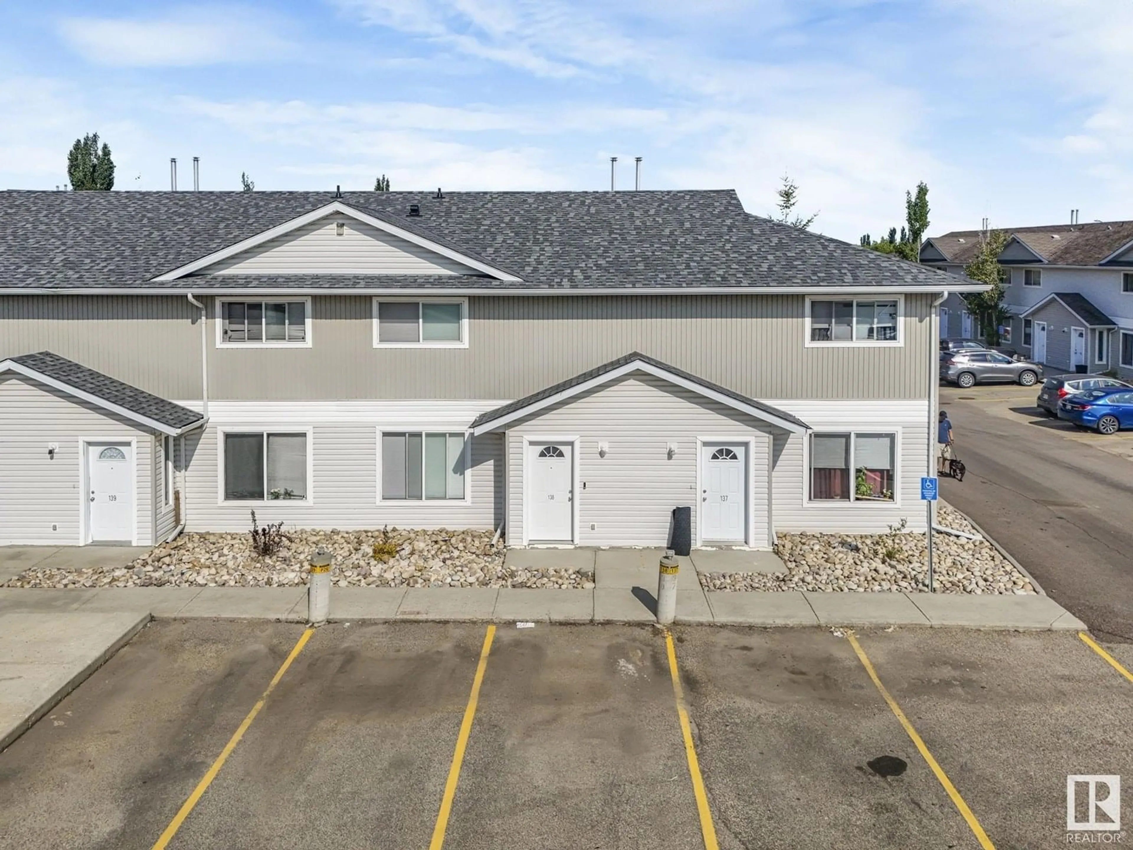 A pic from outside/outdoor area/front of a property/back of a property/a pic from drone, unknown for 138 180 BRIDGEPORT BV, Leduc Alberta T9E8S1