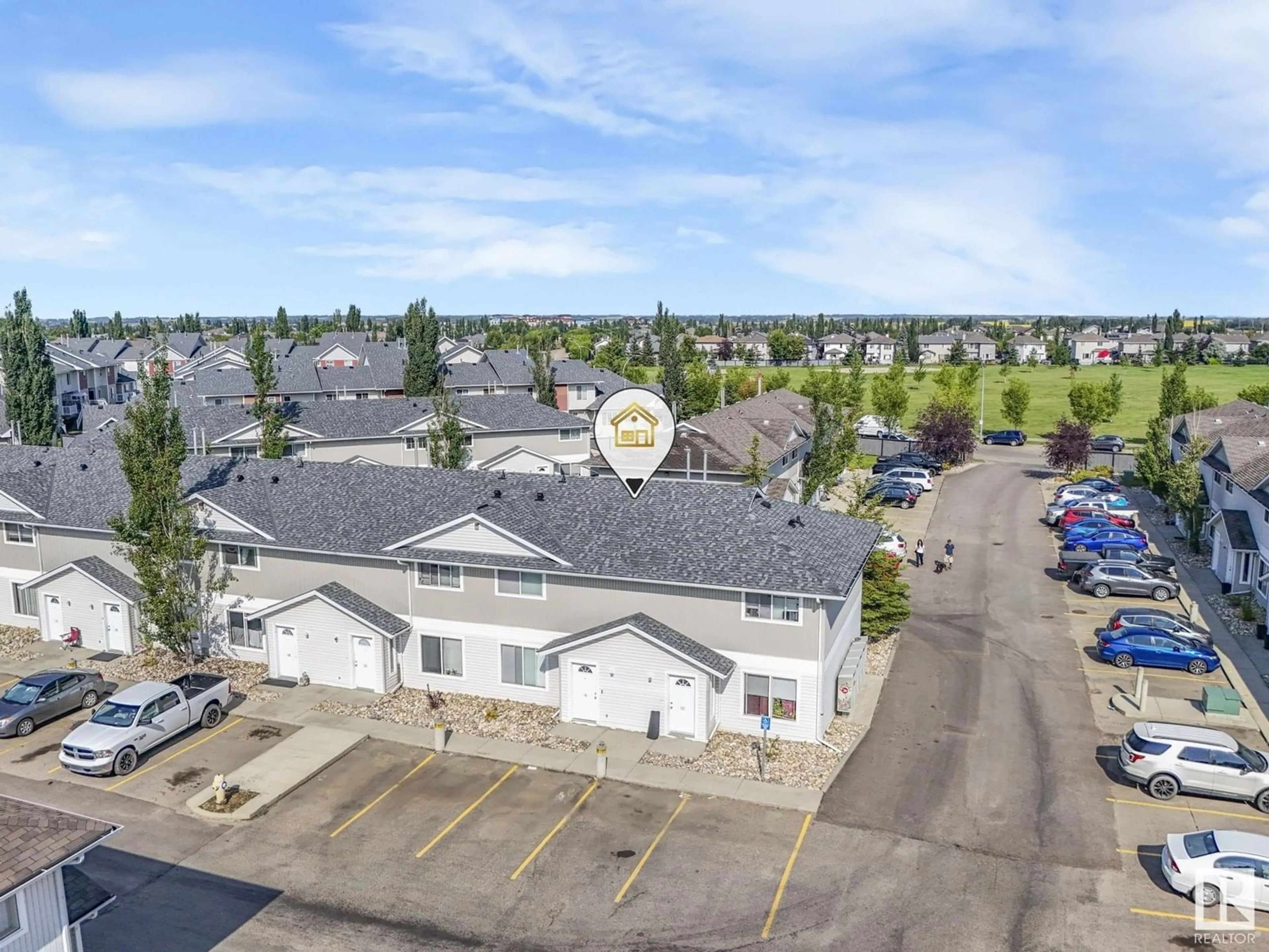 A pic from outside/outdoor area/front of a property/back of a property/a pic from drone, unknown for 138 180 BRIDGEPORT BV, Leduc Alberta T9E8S1