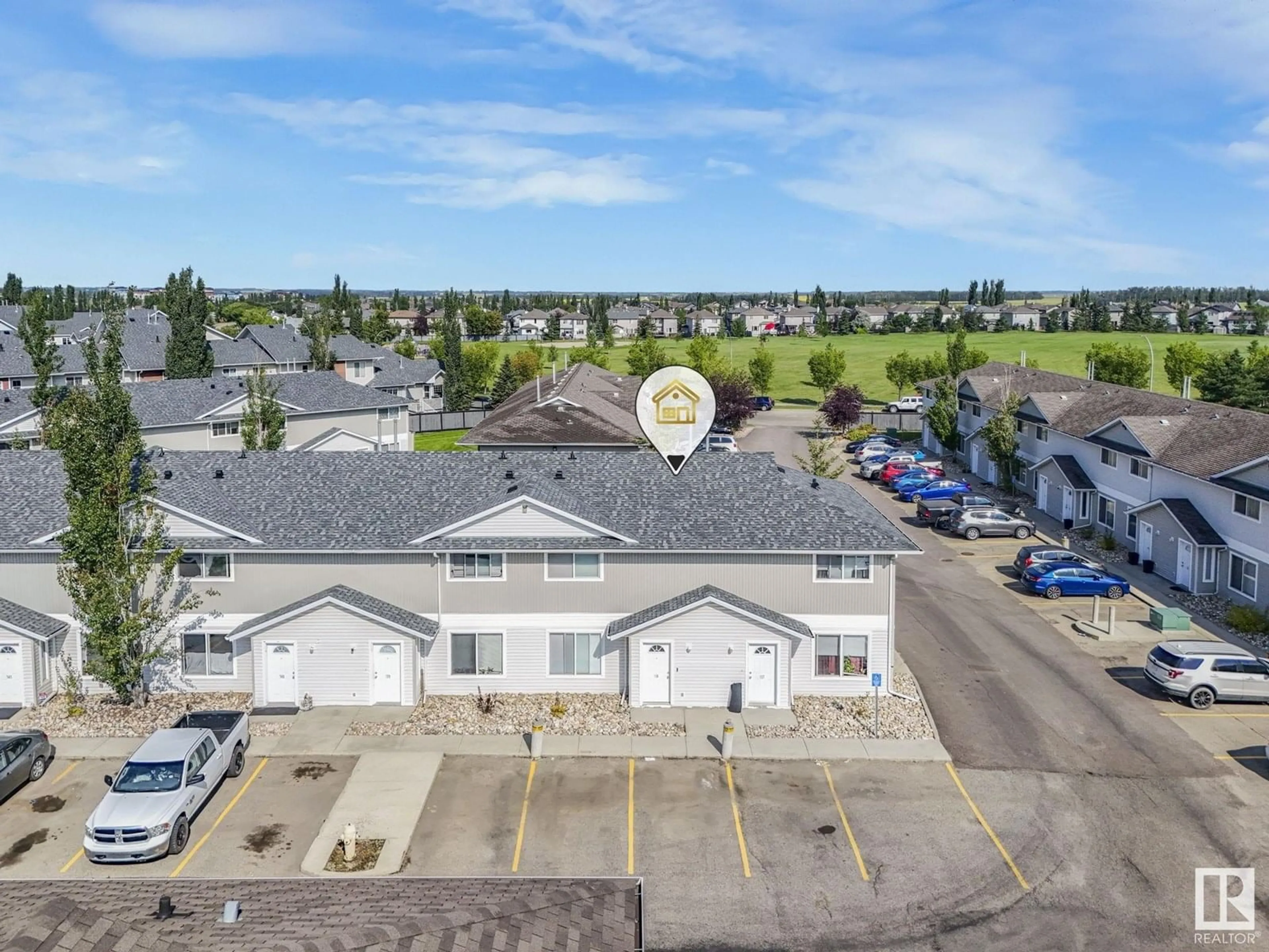 A pic from outside/outdoor area/front of a property/back of a property/a pic from drone, unknown for 138 180 BRIDGEPORT BV, Leduc Alberta T9E8S1