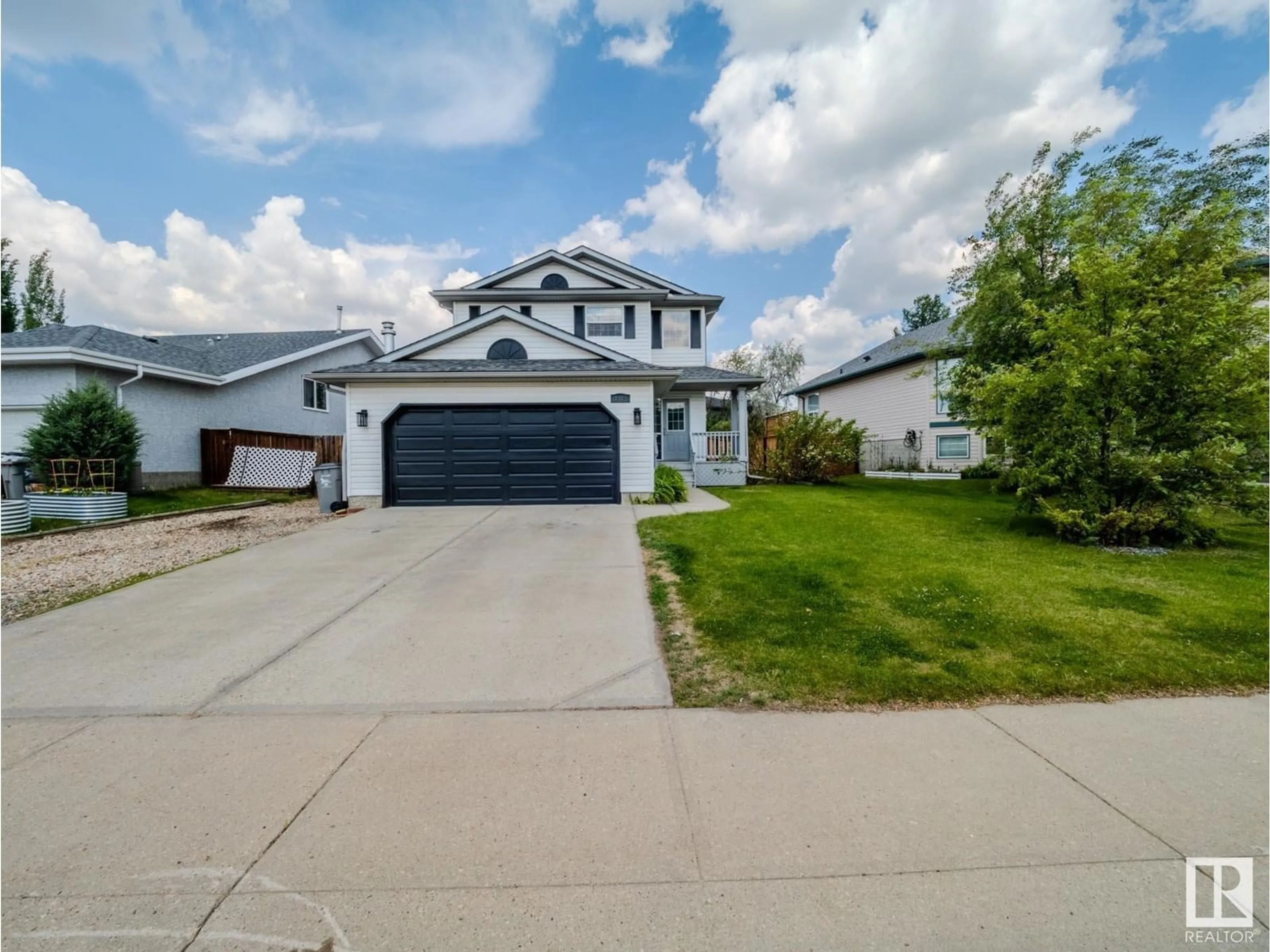 Home with vinyl exterior material, street for 4302 43 AV, Beaumont Alberta T4X1M5