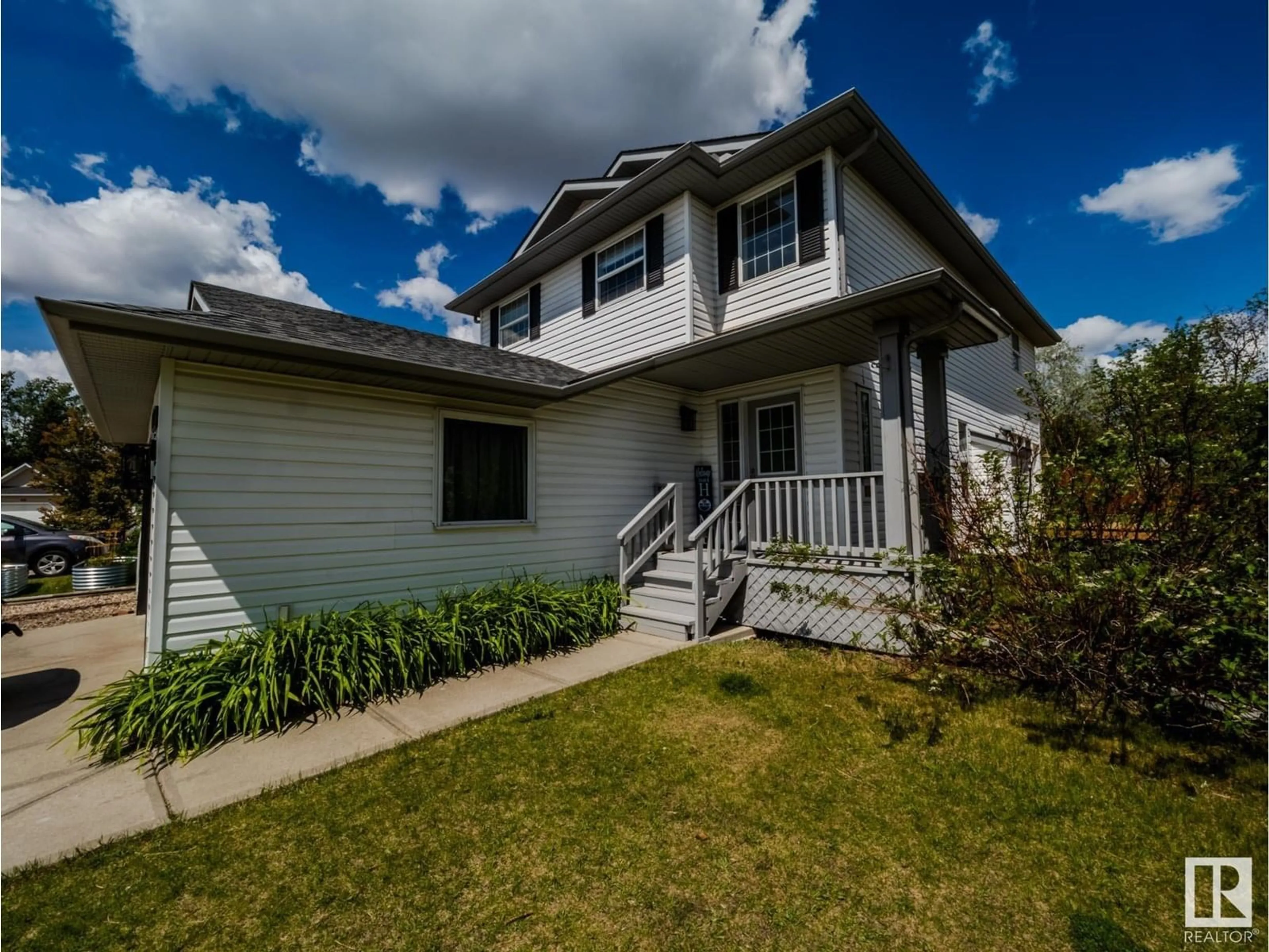 Home with vinyl exterior material, street for 4302 43 AV, Beaumont Alberta T4X1M5