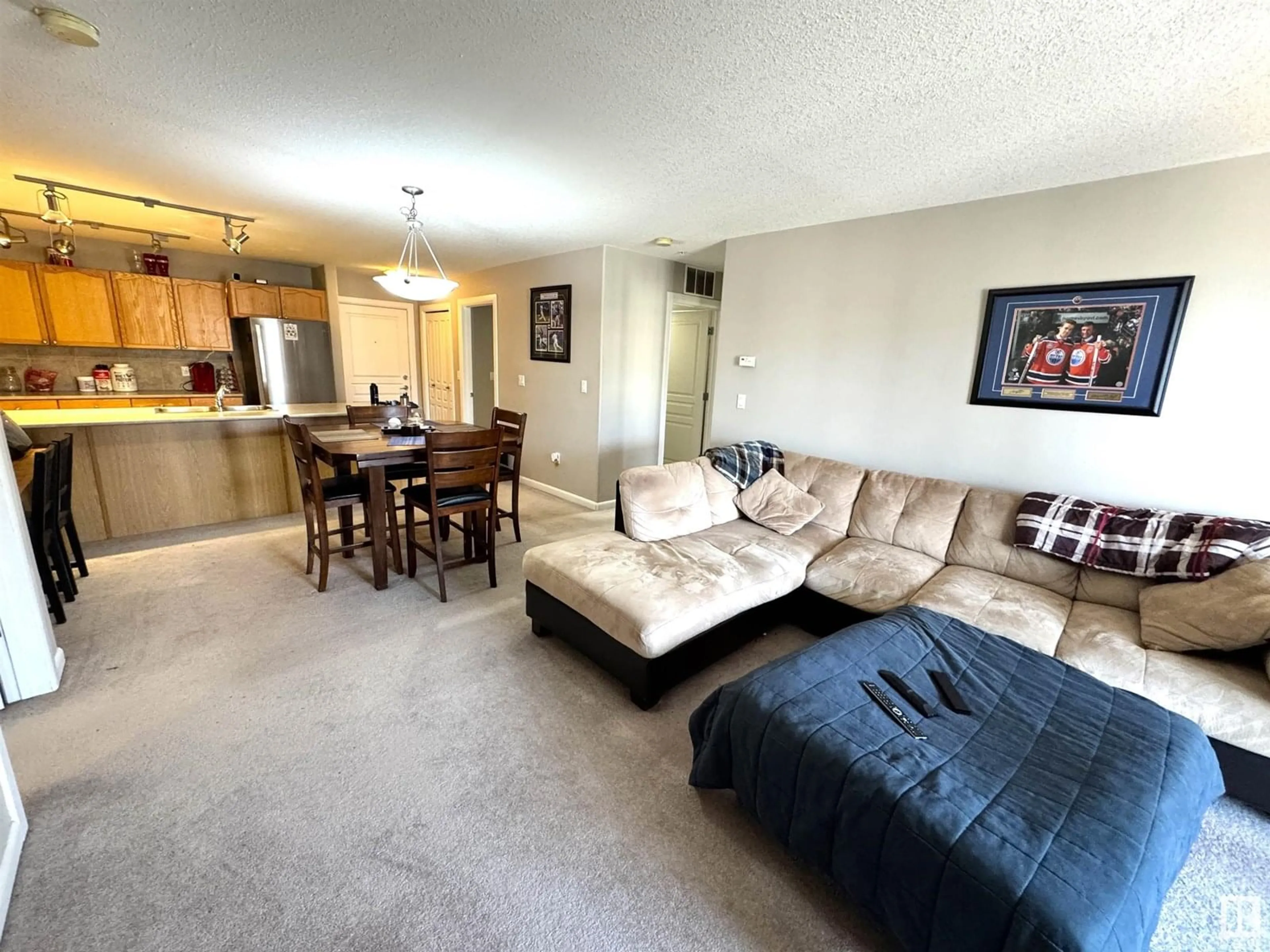 Living room with furniture, unknown for 300 - 333 PALISADES WAY, Sherwood Park Alberta T8H2T9