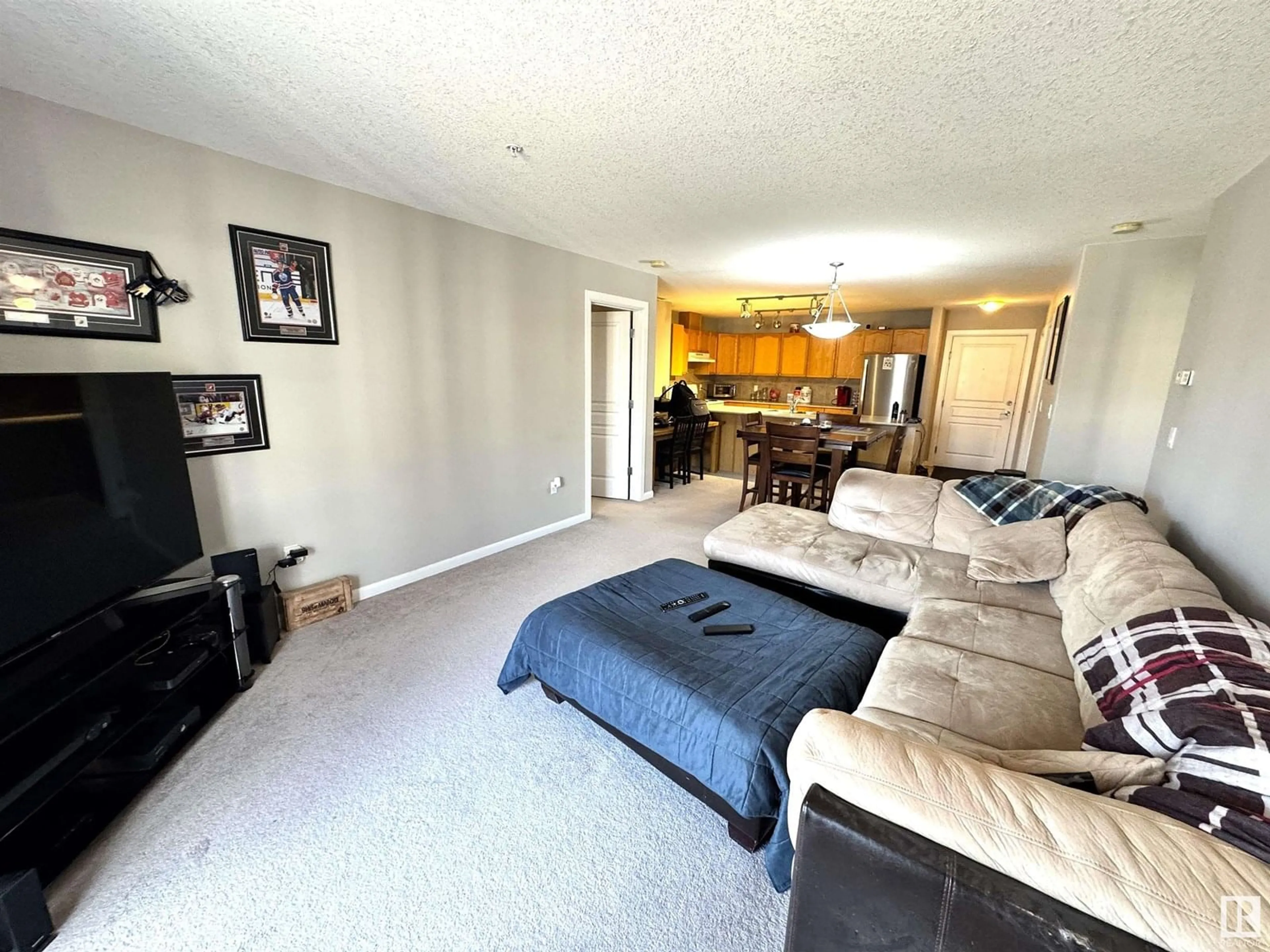 Living room with furniture, unknown for 300 - 333 PALISADES WAY, Sherwood Park Alberta T8H2T9